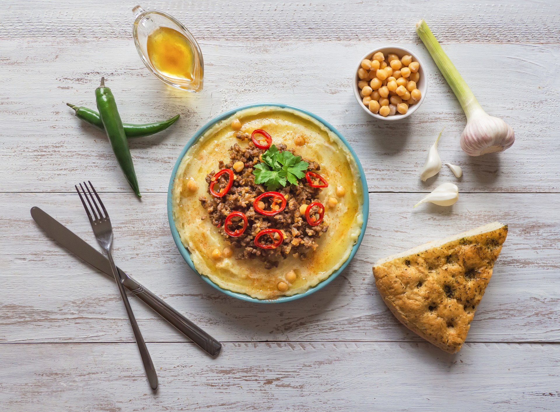 Spicy Egyptian Koshari with Zesty Hot Sauce — Main Course served and photographed from above