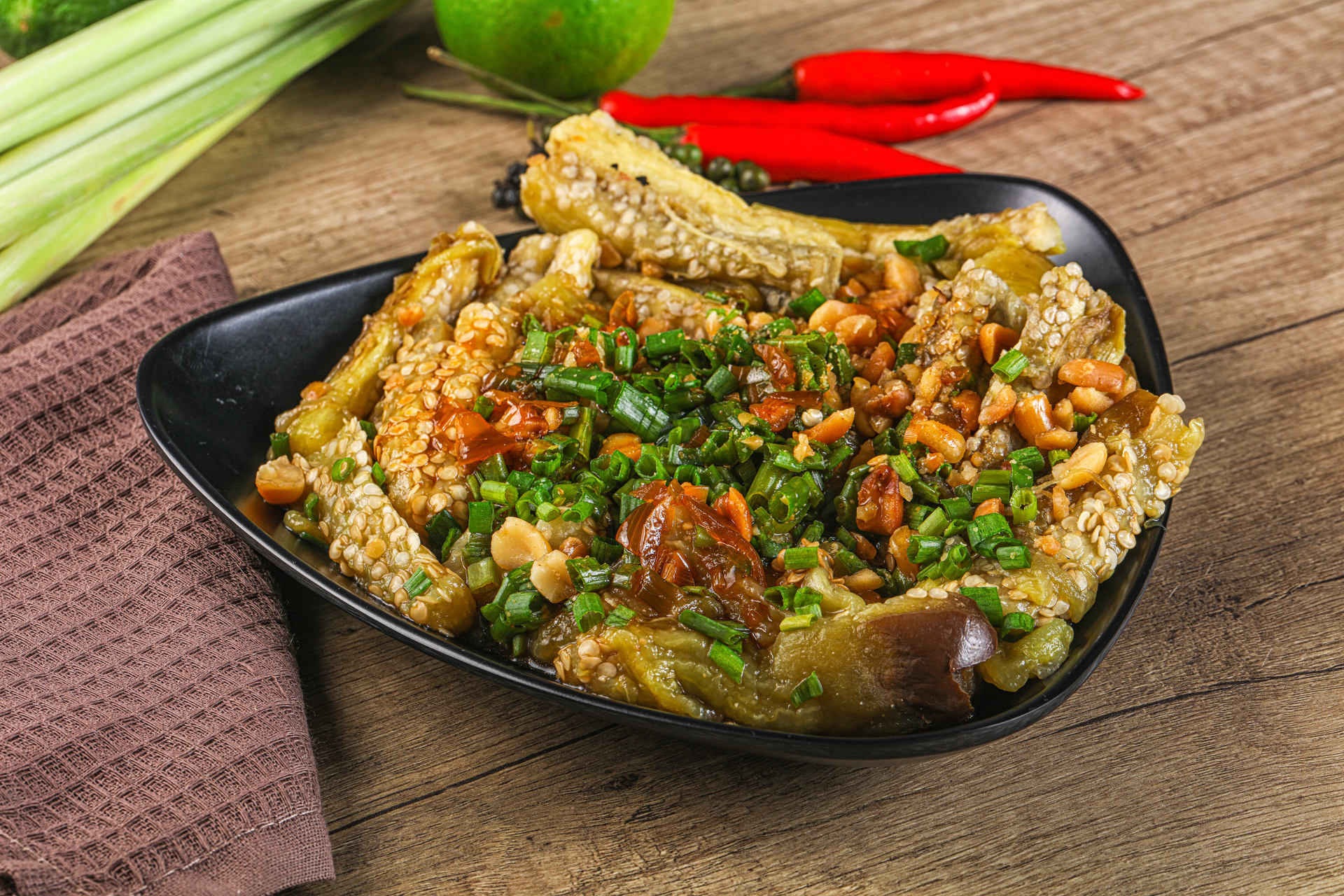 Overhead flat-lay of all ingredients for Spicy Filipino Bicol Express laid out on a kitchen surface.