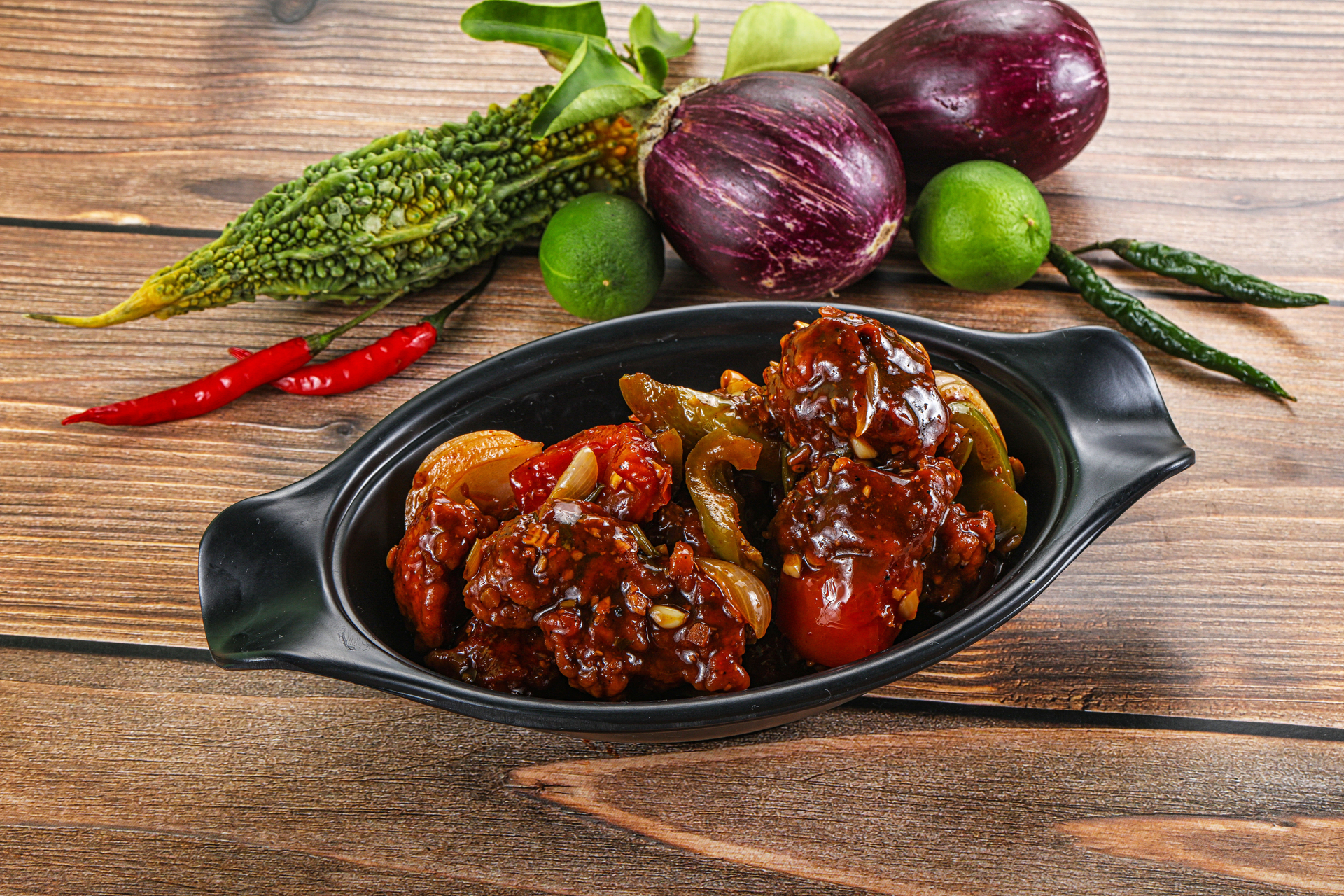 Overhead flat-lay of all ingredients for Spicy Indonesian Sambal Terong with Fried Eggplant laid out on a kitchen surface.