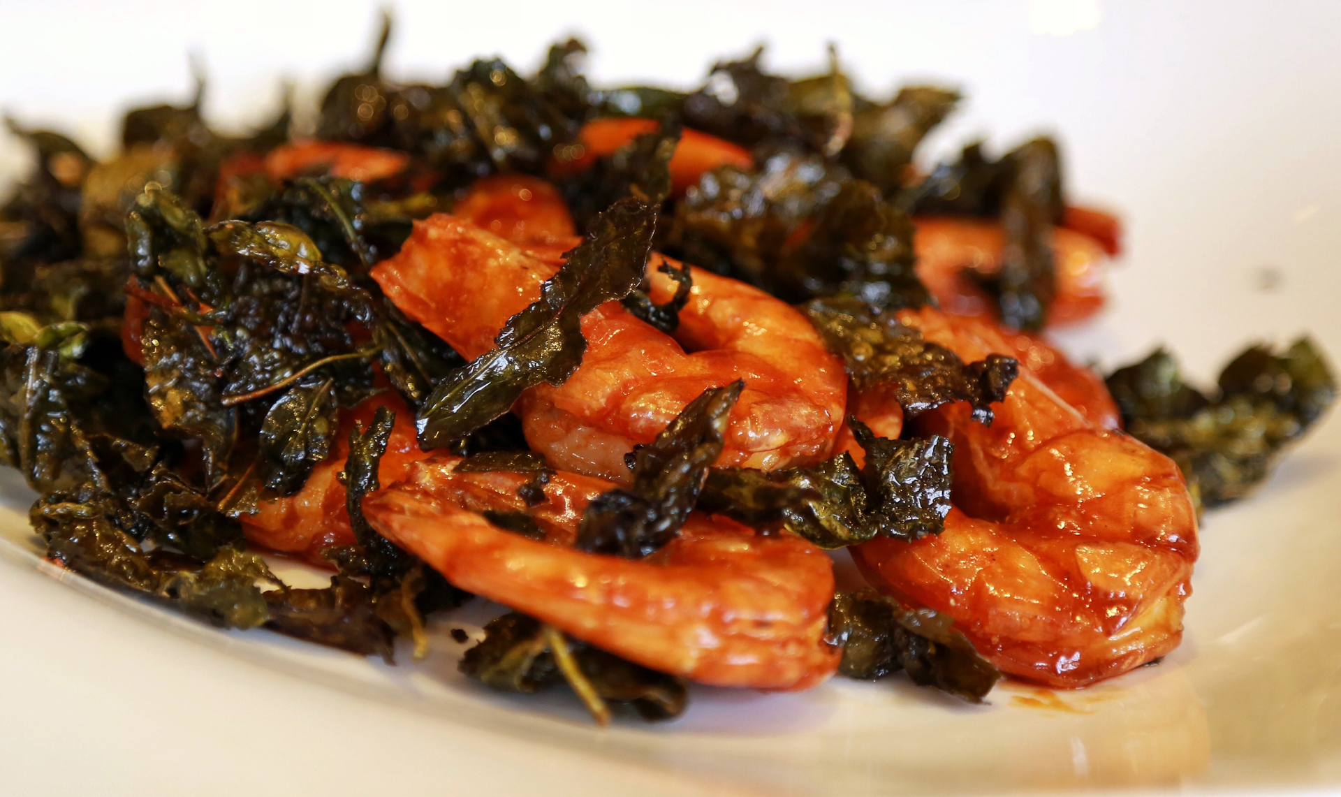 Overhead flat-lay of all ingredients for Spicy Jamaican Pepper Shrimp with Scotch Bonnet laid out on a kitchen surface.