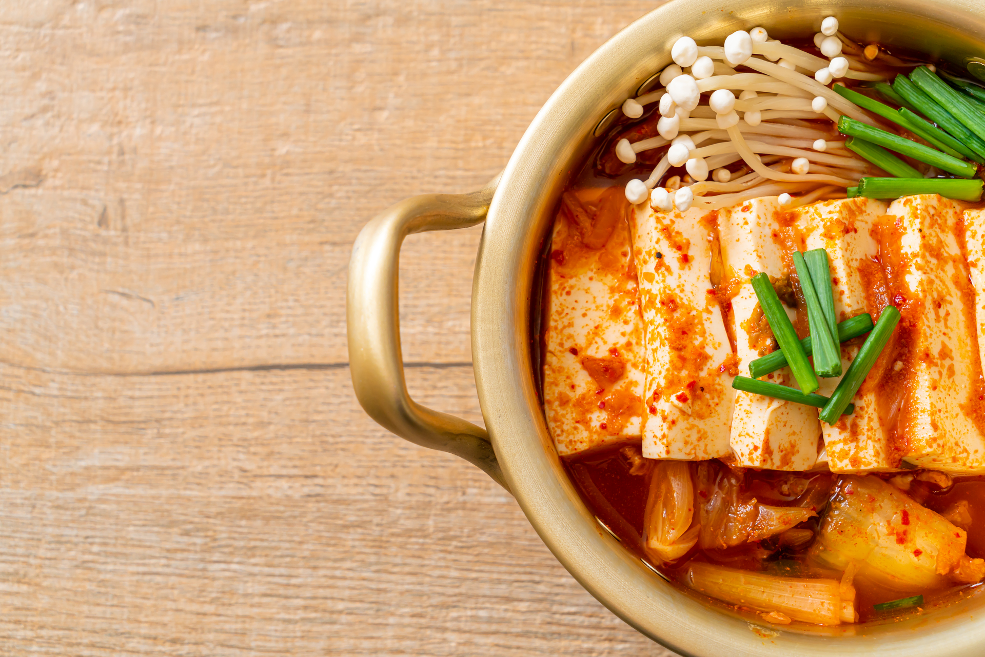 Spicy Korean Kimchi Jjigae with Tofu — Main Course served and photographed from above