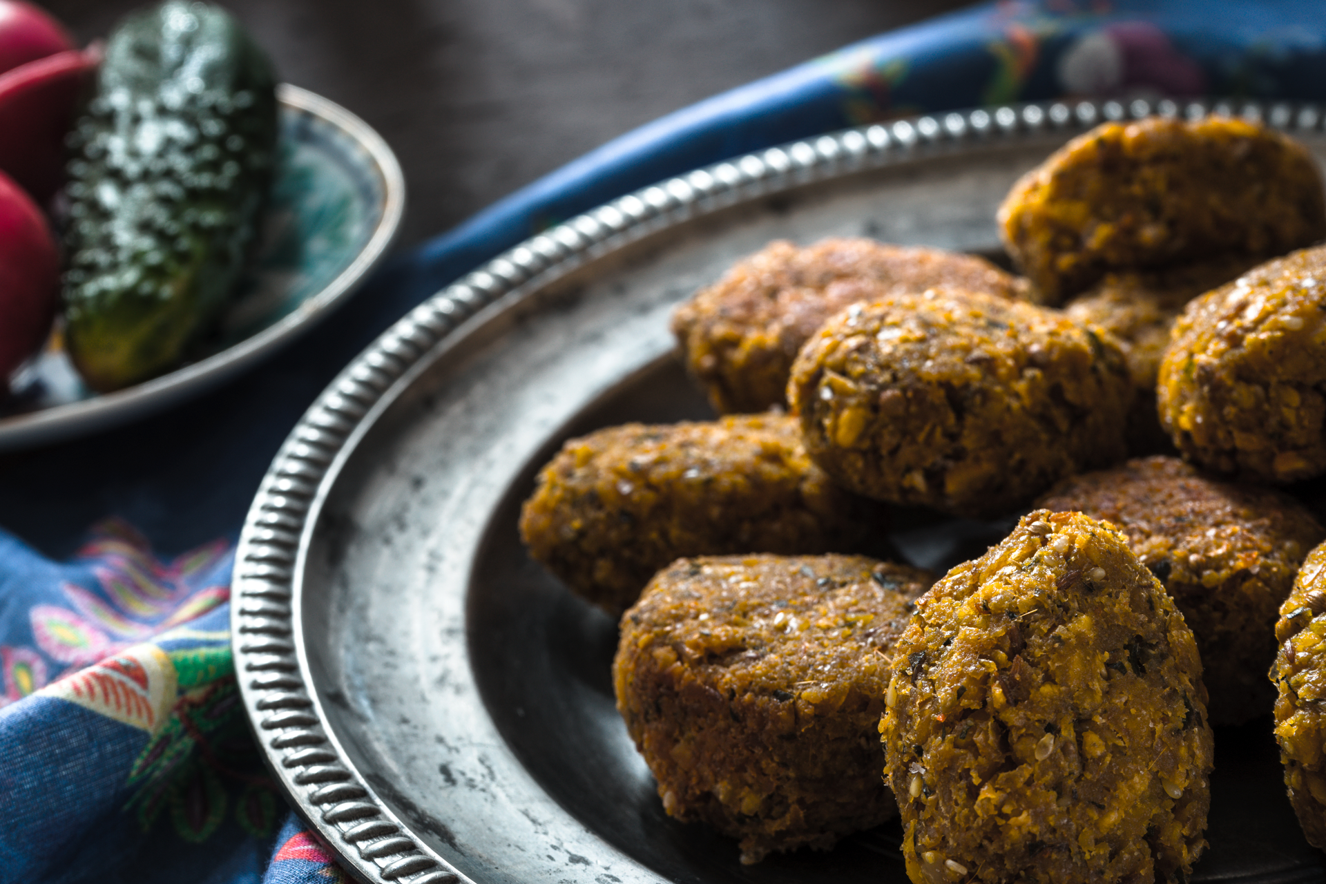 Overhead flat-lay of all ingredients for Spicy Lebanese Kibbeh Nayyeh with Aromatic Spices laid out on a kitchen surface.