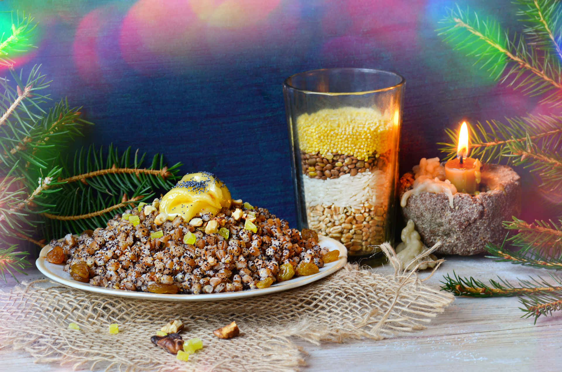 Overhead flat-lay of all ingredients for Spicy Tunisian Lamb Couscous with Preserved Lemon and Pistachios laid out on a kitchen surface.