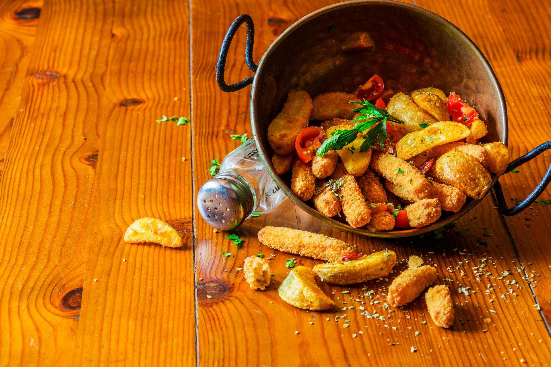 Overhead flat-lay of all ingredients for Spicy Ugandan Matoke with Groundnut Sauce laid out on a kitchen surface.