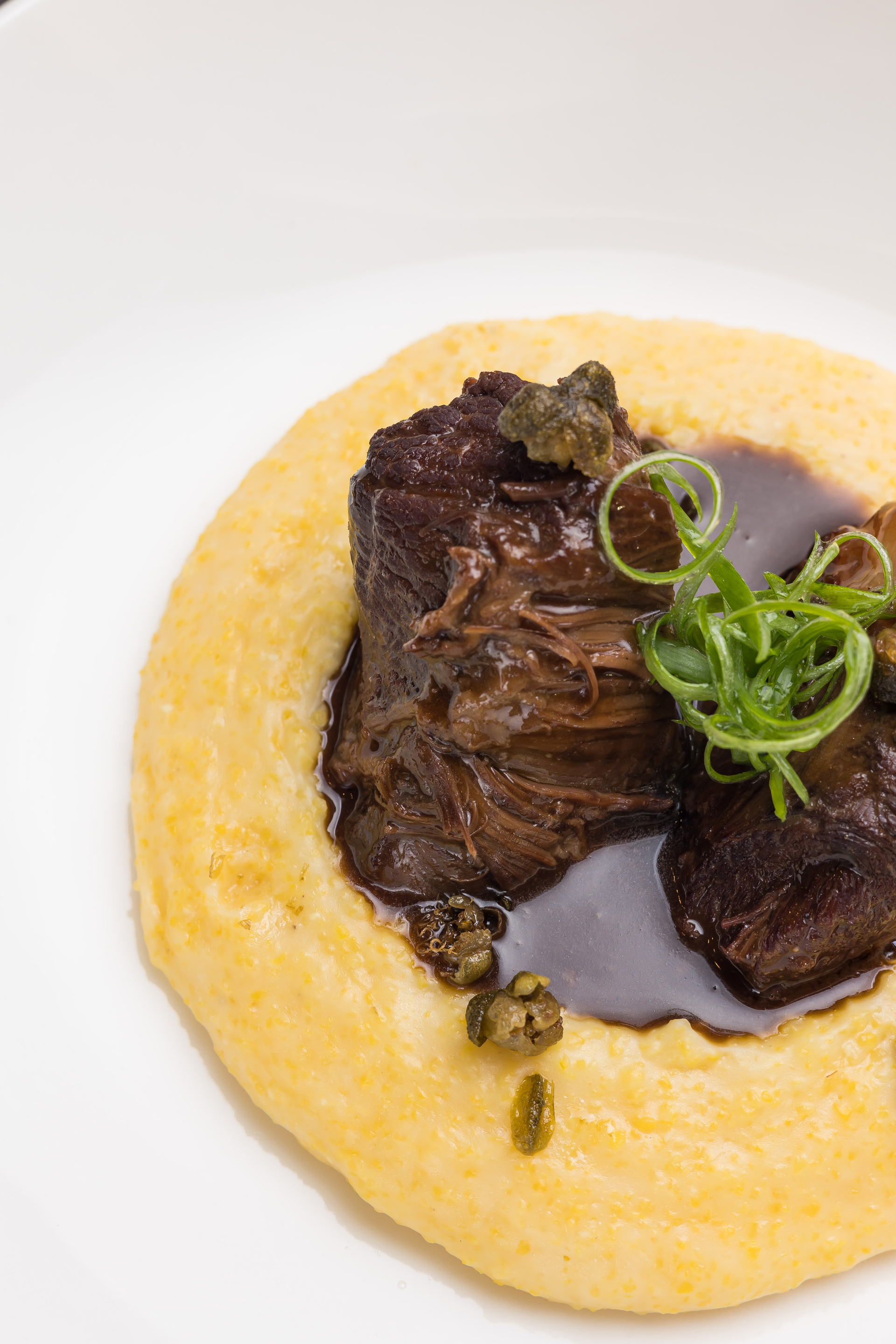 Stracotto al Barolo with Polenta — Main Course served and photographed from above