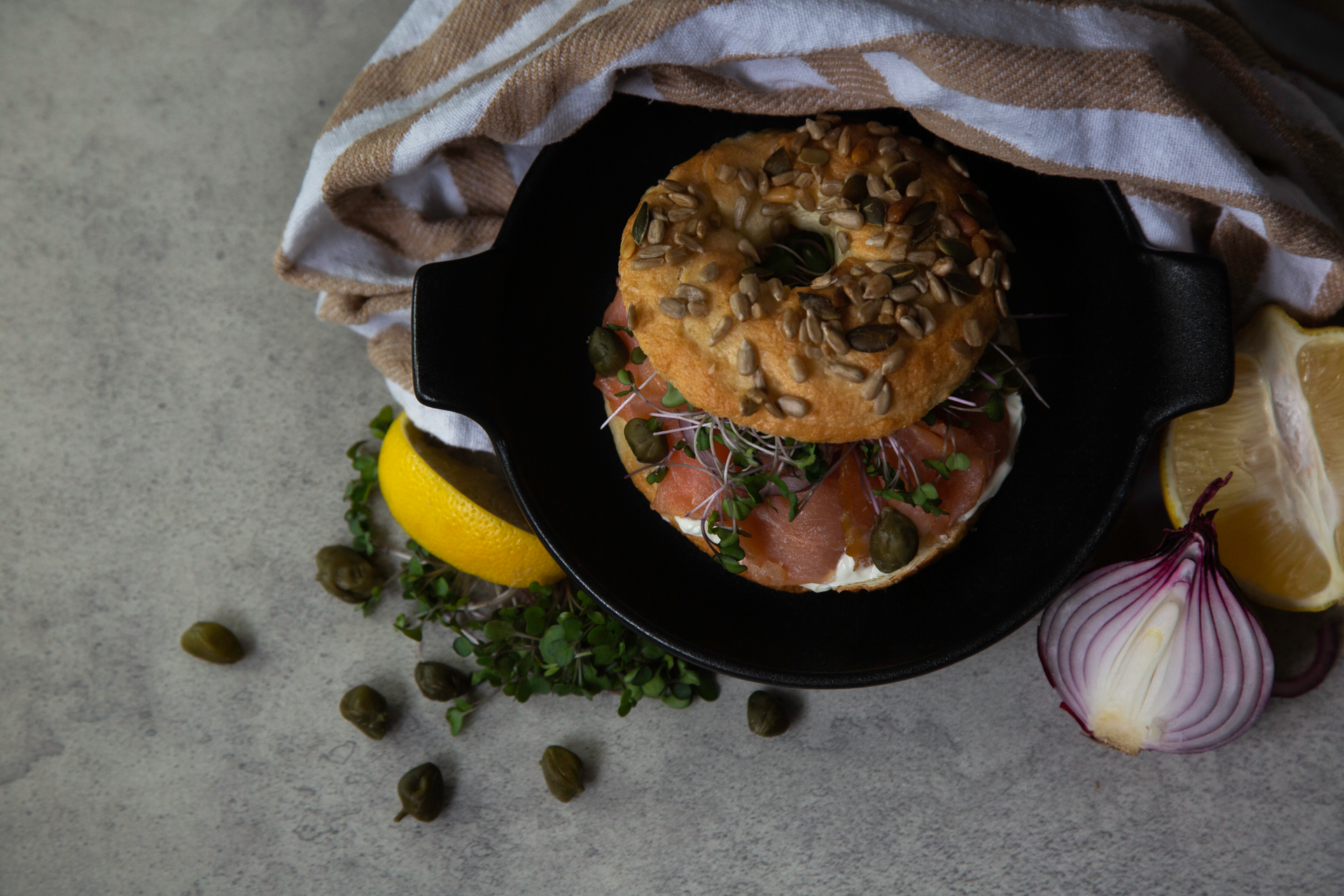 Overhead flat-lay of all ingredients for Succulent Estonian Silgusoust laid out on a kitchen surface.