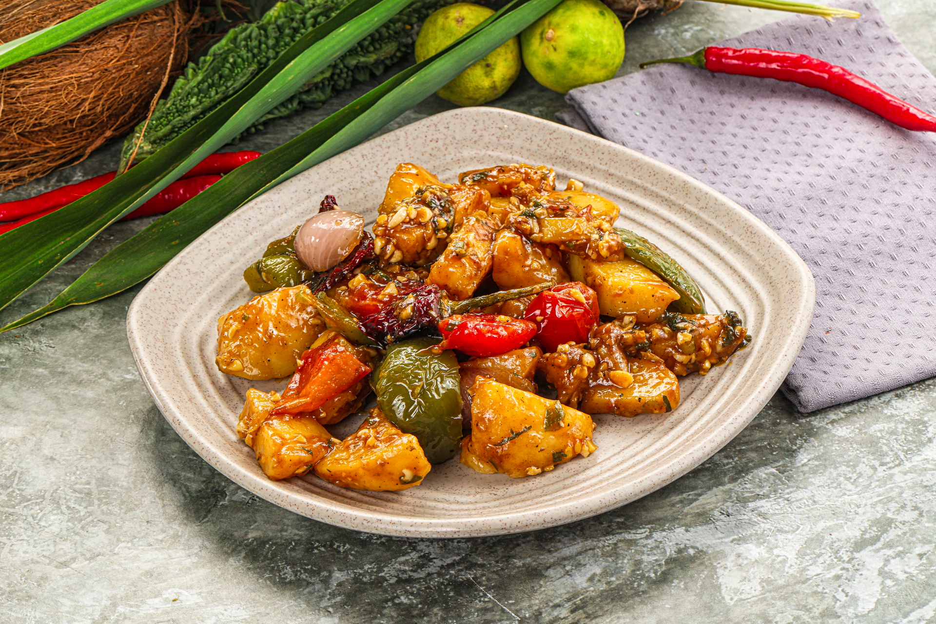 Overhead flat-lay of all ingredients for Succulent Malaysian Sambal Clams with Pineapple Tempeh laid out on a kitchen surface.