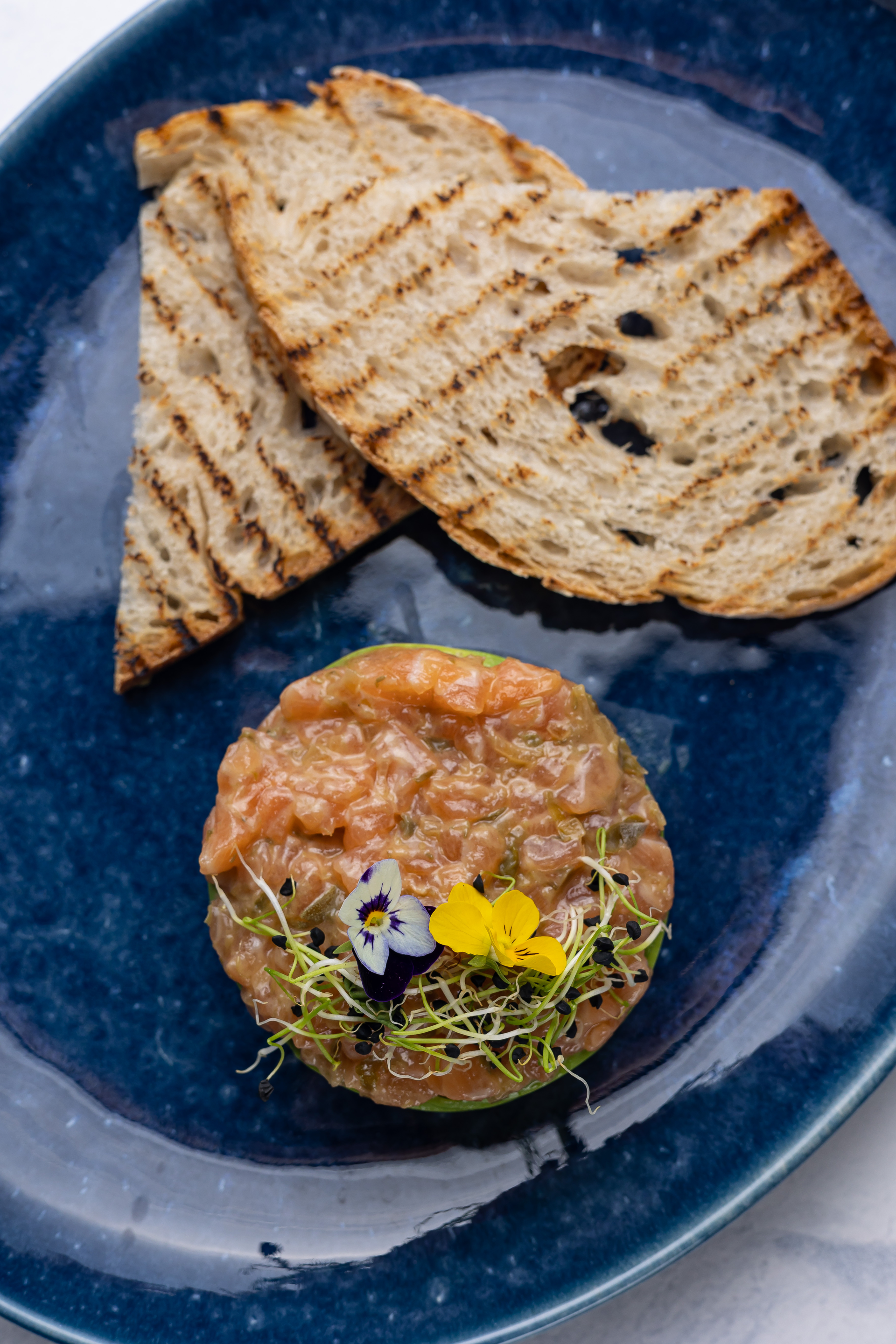 Succulent Tunisian Grilled Brik with Egg and Tuna Filling — Main Course served and photographed from above
