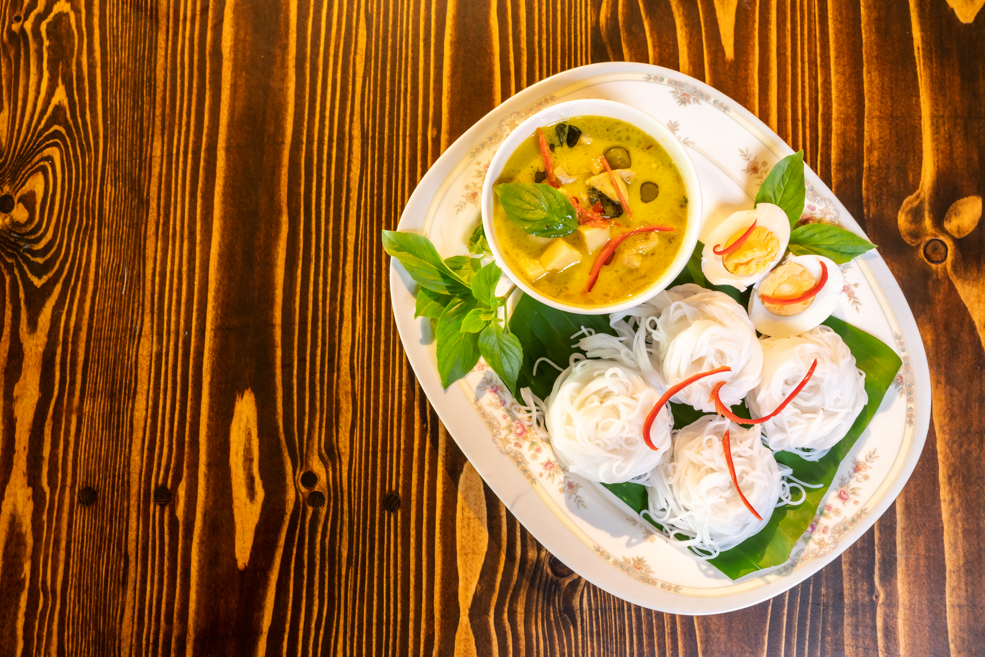 Sumptuous Cambodian Prahok Ktis with Coconut Milk and Fermented Fish — Main Course served and photographed from above