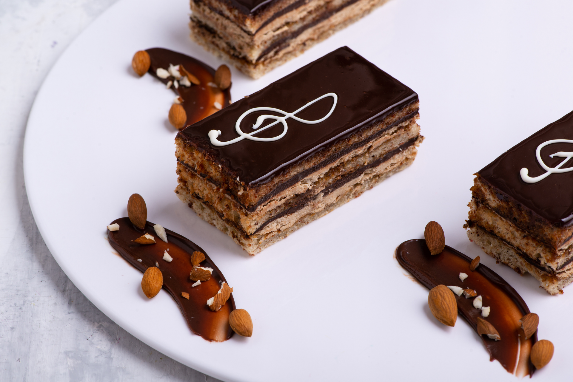 Overhead flat-lay of all ingredients for Sumptuous French Chocolate Mille-Feuille laid out on a kitchen surface.