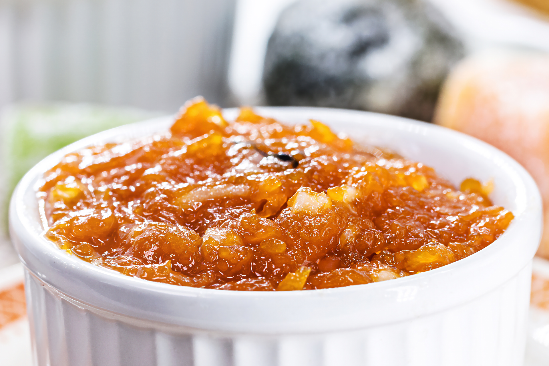 Overhead flat-lay of all ingredients for Sumptuous South African Bobotie with Apricot Chutney Glaze laid out on a kitchen surface.