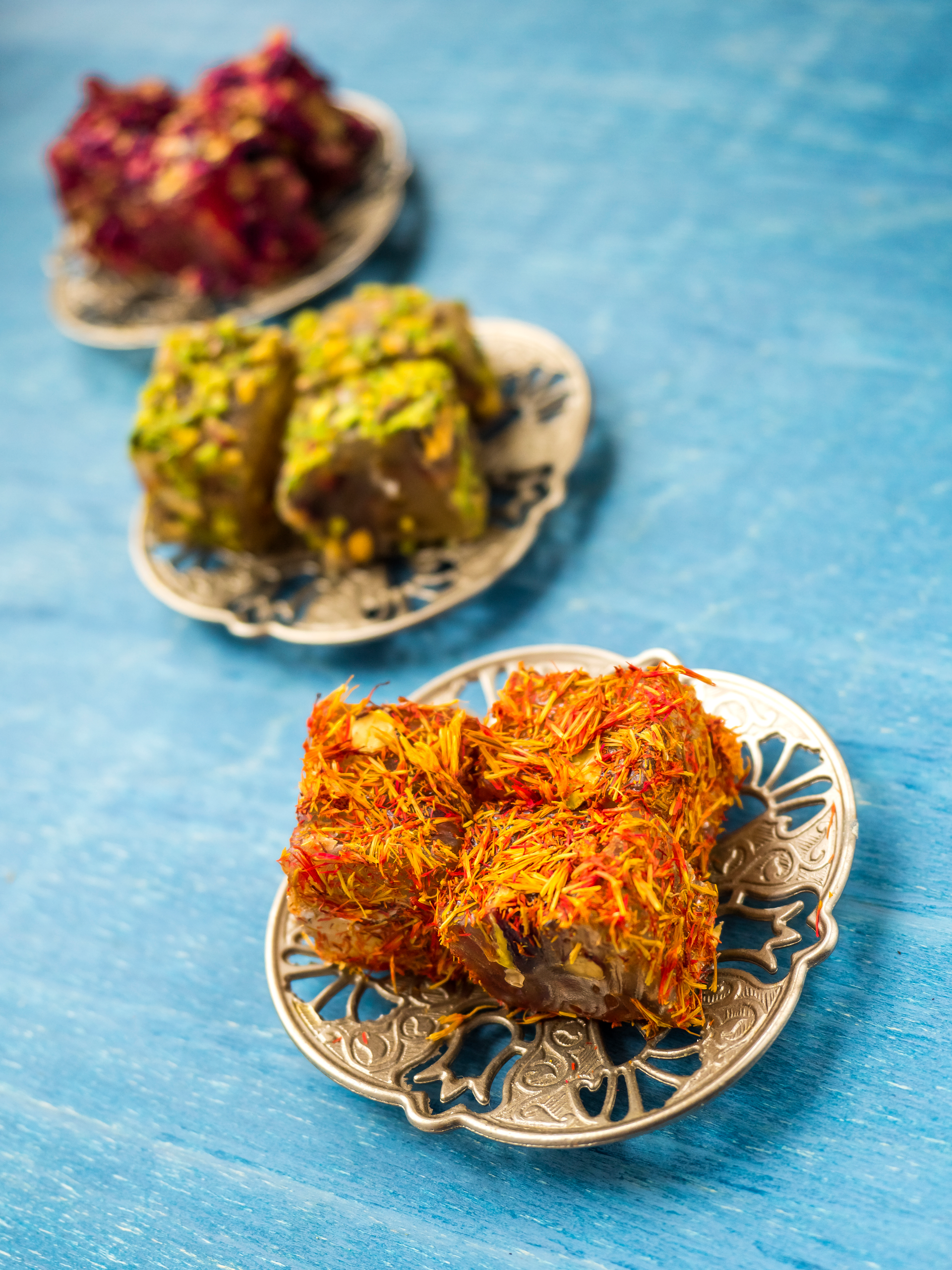 Sweet Persian Baklava with Pistachio and Rose Water Syrup — Dessert served and photographed from above