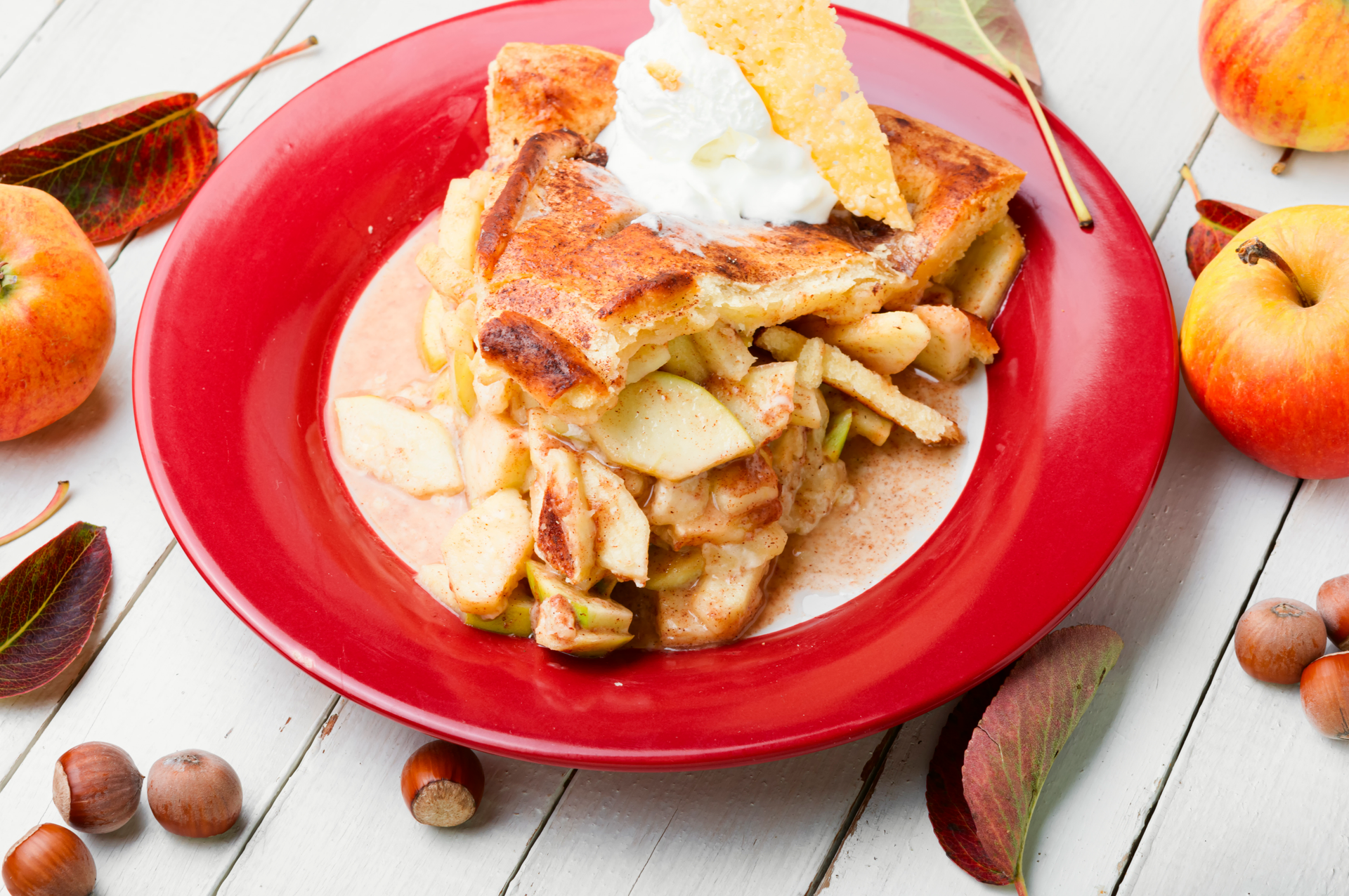 Overhead flat-lay of all ingredients for Swiss Rösti with Apples and Bacon laid out on a kitchen surface.