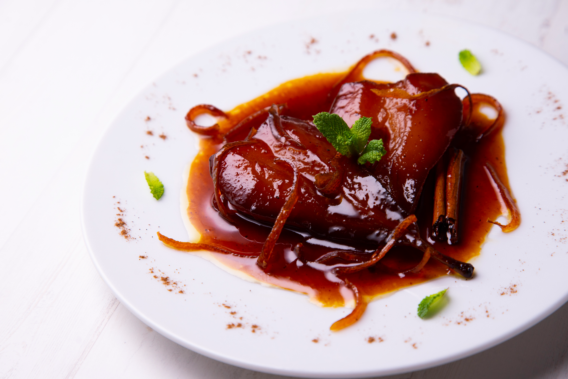 Overhead flat-lay of all ingredients for Szechuan Crispy Duck with Chili-Garlic Sauce laid out on a kitchen surface.