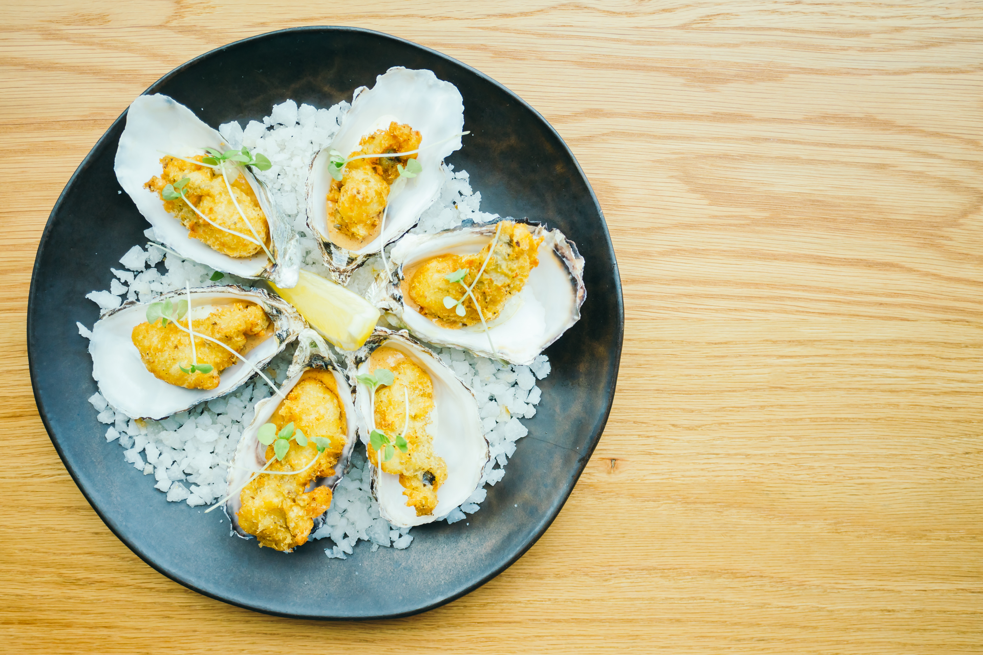 Overhead flat-lay of all ingredients for Taiwanese Oyster Omelette laid out on a kitchen surface.