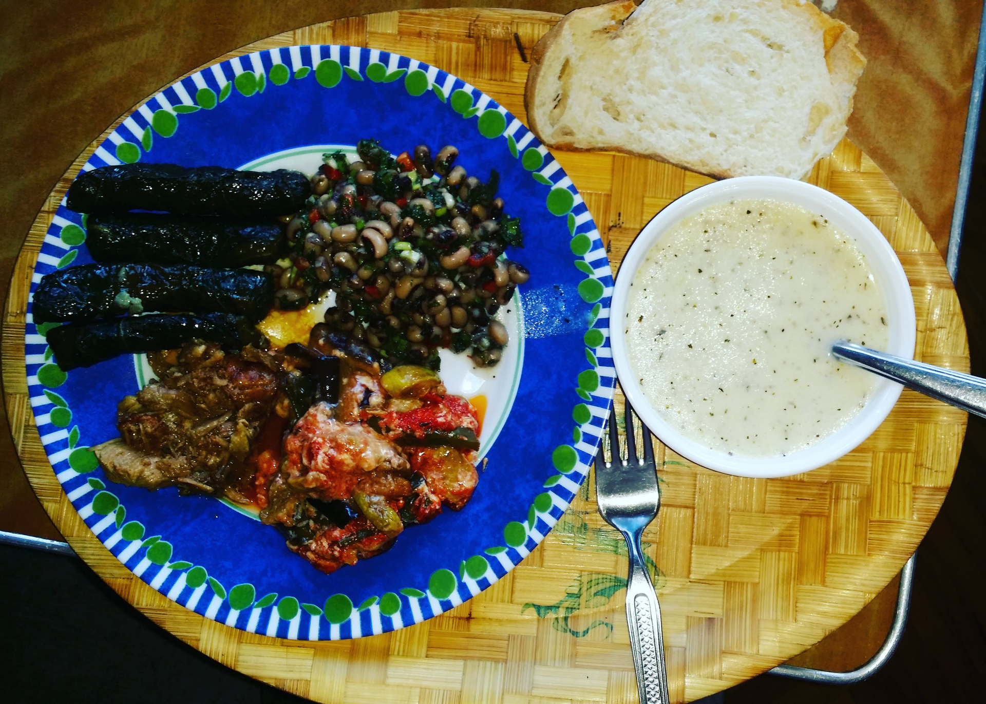 Overhead flat-lay of all ingredients for Tangy Ethiopian Misir Wot laid out on a kitchen surface.