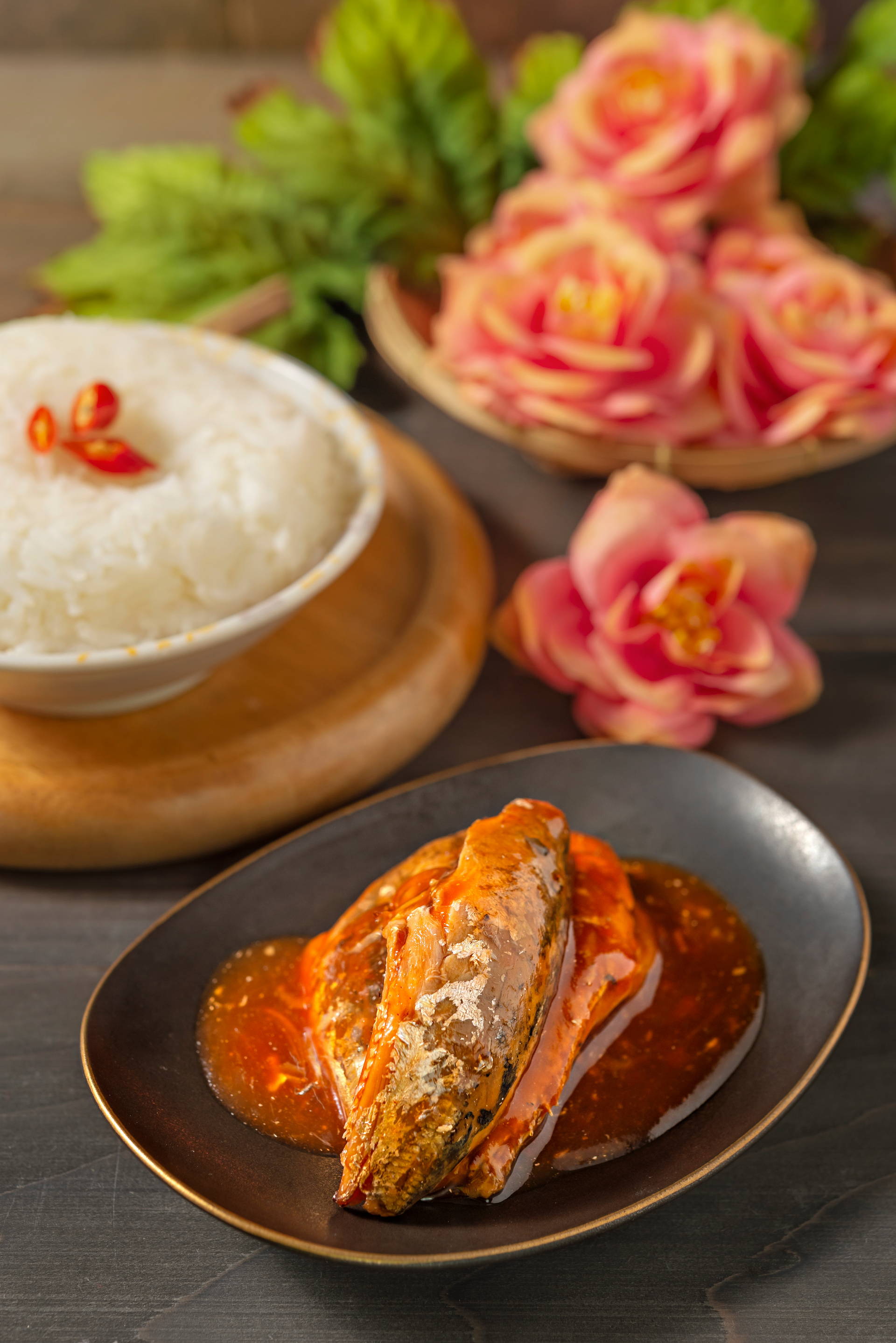 Overhead flat-lay of all ingredients for Tangy Filipino Paksiw na Isda with Vinegar and Ginger laid out on a kitchen surface.
