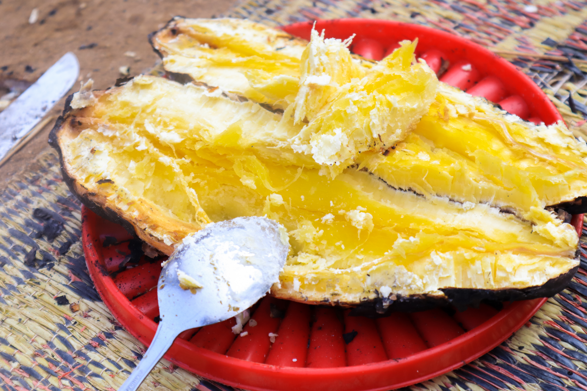 Overhead flat-lay of all ingredients for Tangy Greek Saganaki Cheese with Lemon Honey Drizzle laid out on a kitchen surface.