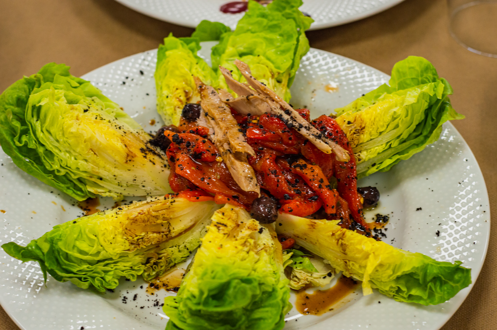 Overhead flat-lay of all ingredients for Tangy Haitian Pikliz with Scotch Bonnet and Cabbage laid out on a kitchen surface.