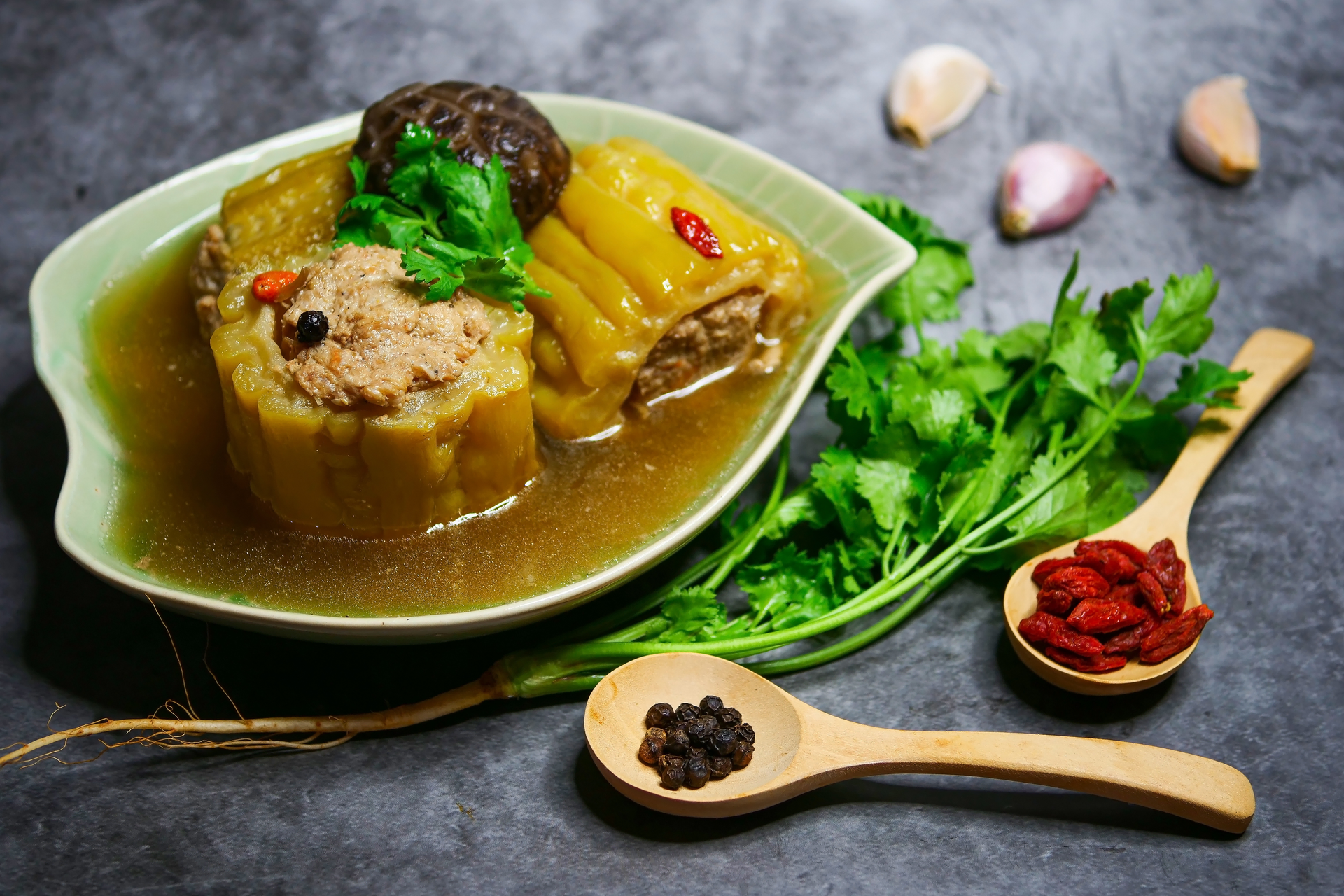 Overhead flat-lay of all ingredients for Tangy Tibetan Shaptra with Sichuan Peppercorns and Ginger laid out on a kitchen surface.