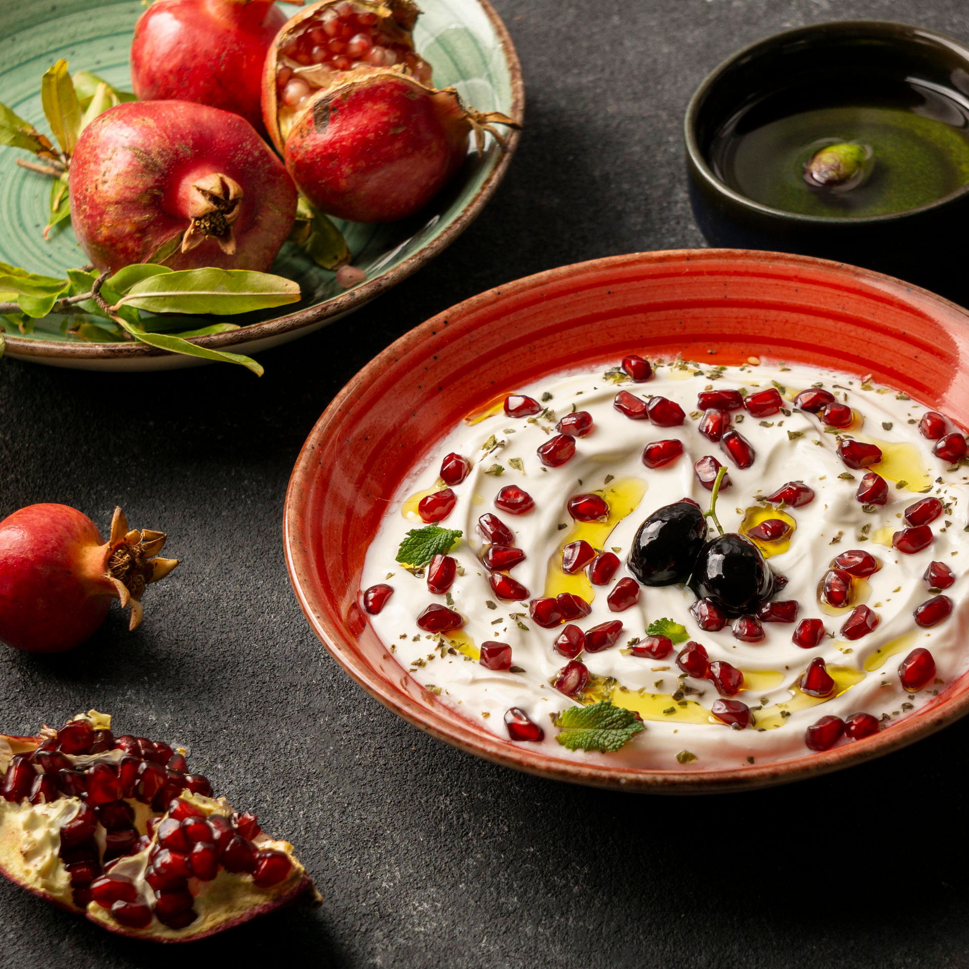 Tangy Turkish Tarator with Walnut and Pomegranate Molasses — Appetizer served and photographed from above