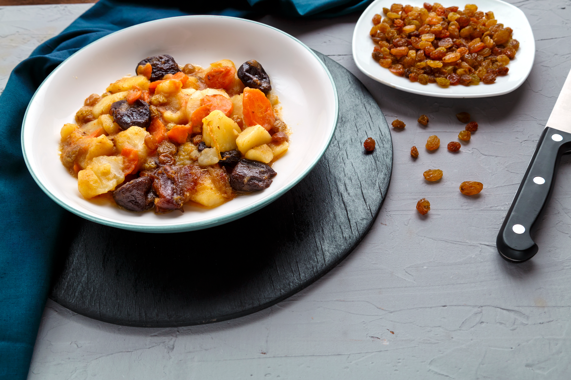 Tender Croatian Pasticada with Gnocchi and Prunes — Main Course served and photographed from above