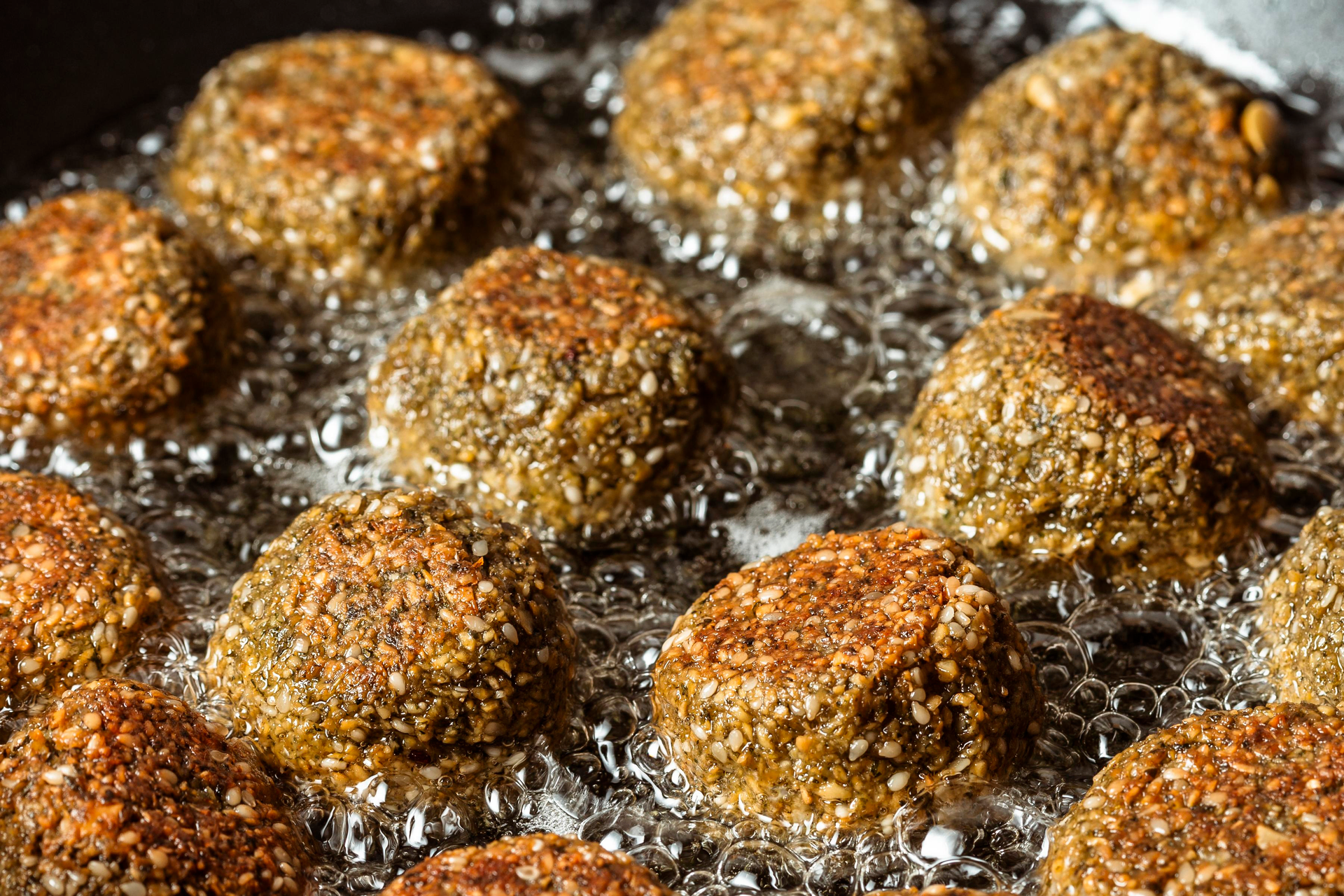Overhead flat-lay of all ingredients for Tender Lebanese Kibbeh Labanieh laid out on a kitchen surface.