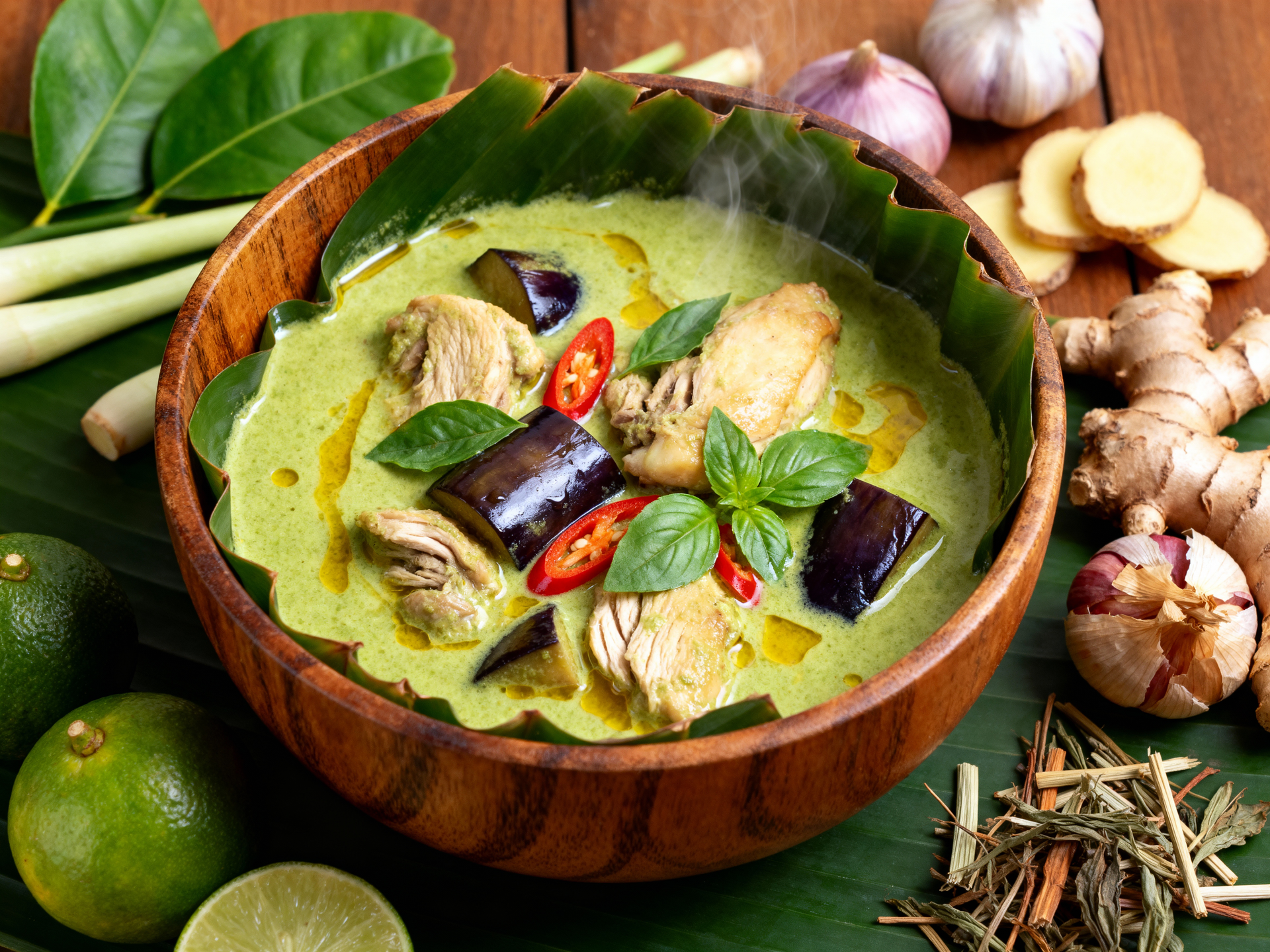 Overhead flat-lay of all ingredients for Thai Coconut Curry Mussels with Kaffir Lime and Fresh Basil laid out on a kitchen surface.