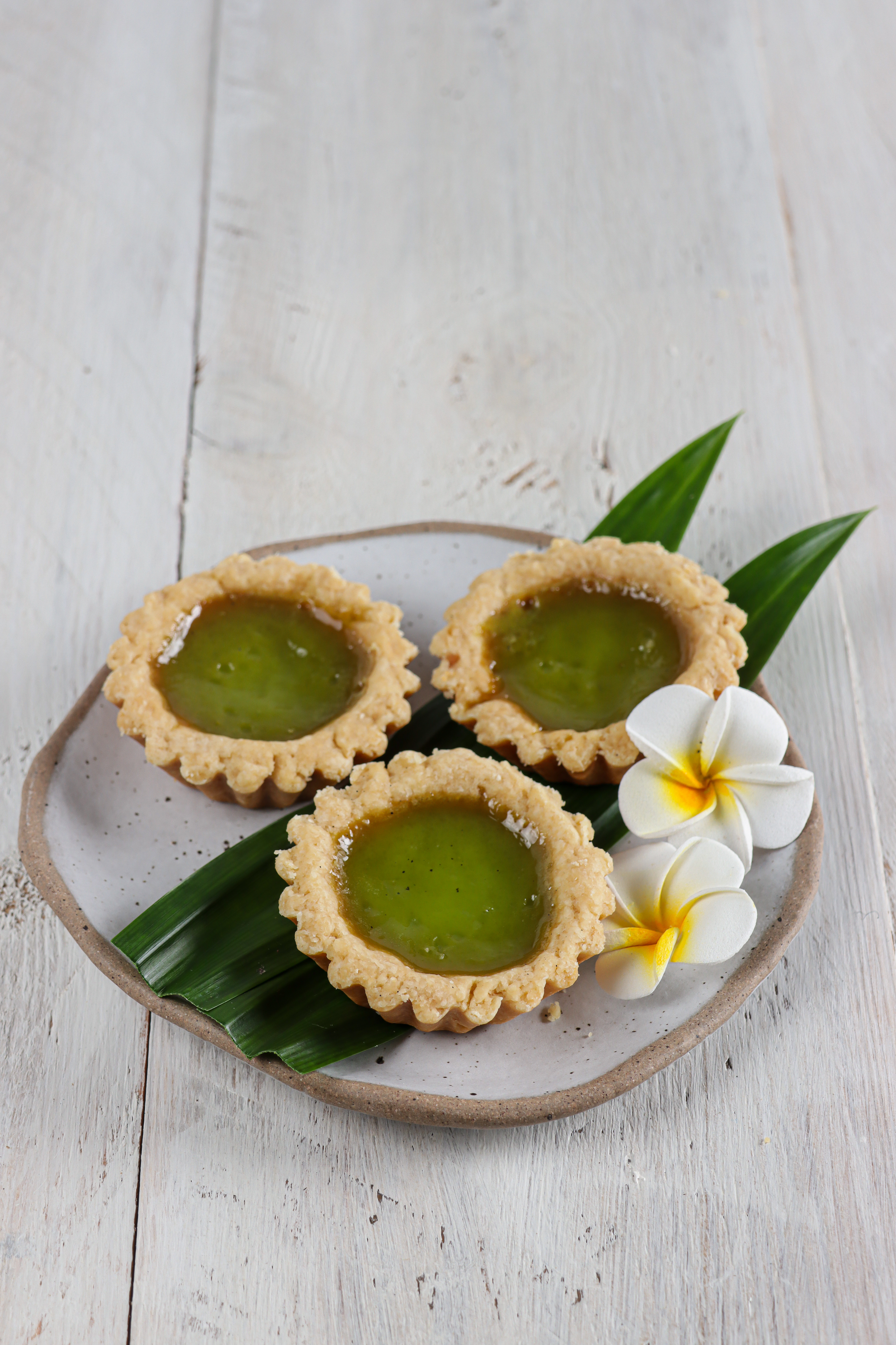 Thai Coconut Pandan Leaf Cake with Palm Sugar Syrup — Dessert served and photographed from above