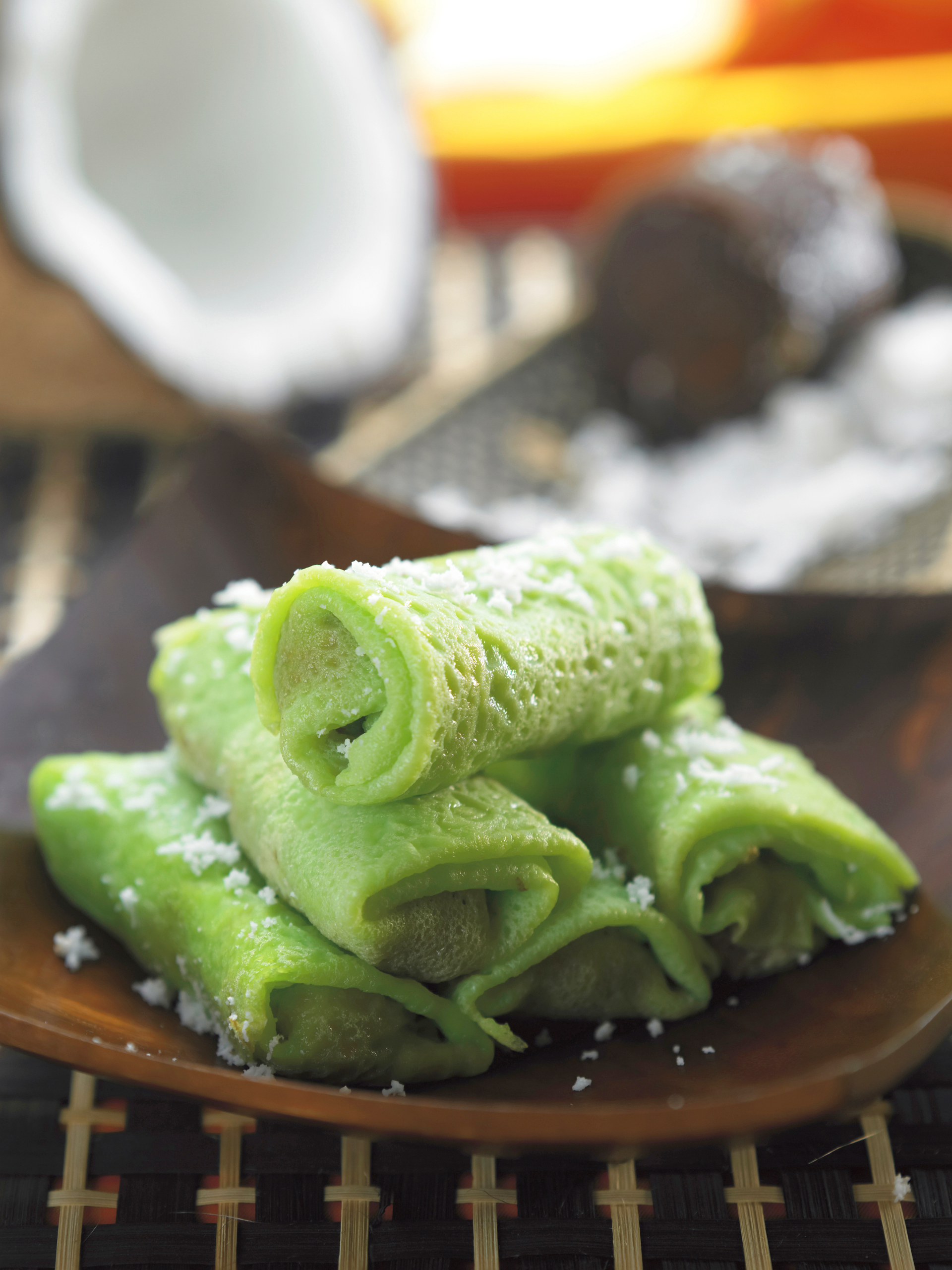 Thai Pandan Pancakes with Young Coconut Filling — Dessert served and photographed from above