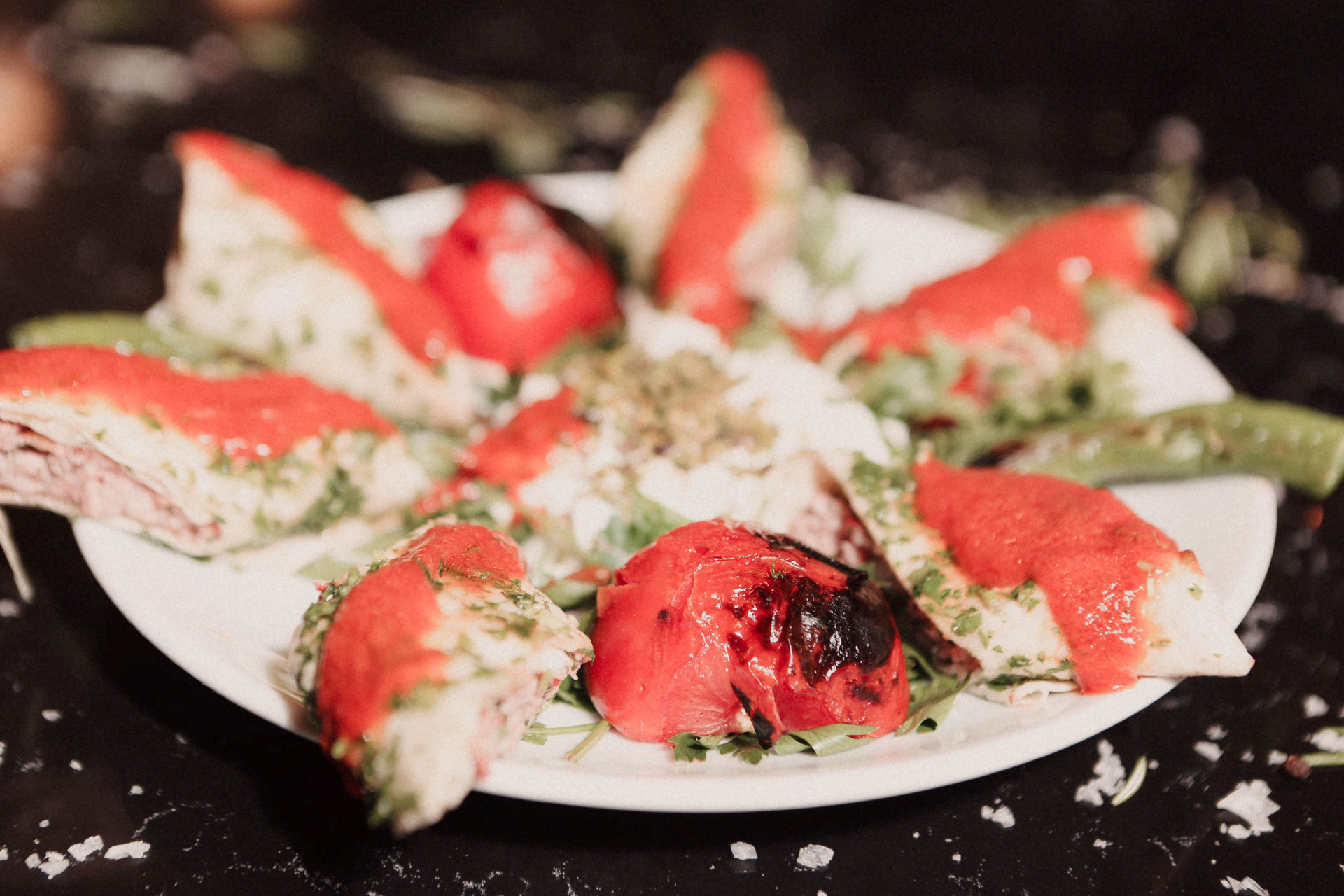 Overhead flat-lay of all ingredients for Traditional Cypriot Halloumi with Watermelon laid out on a kitchen surface.