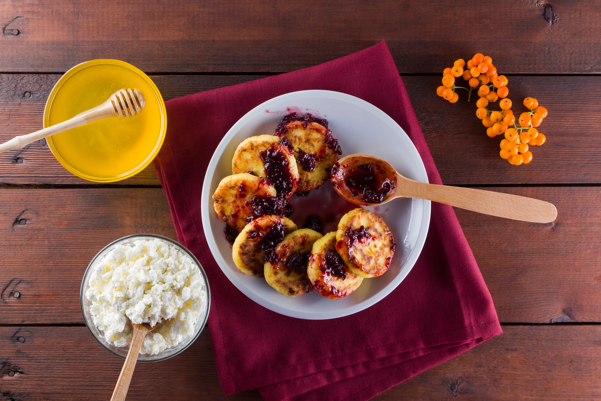 Overhead flat-lay of all ingredients for Trinidad Doubles with Tangy Mango Chutney laid out on a kitchen surface.