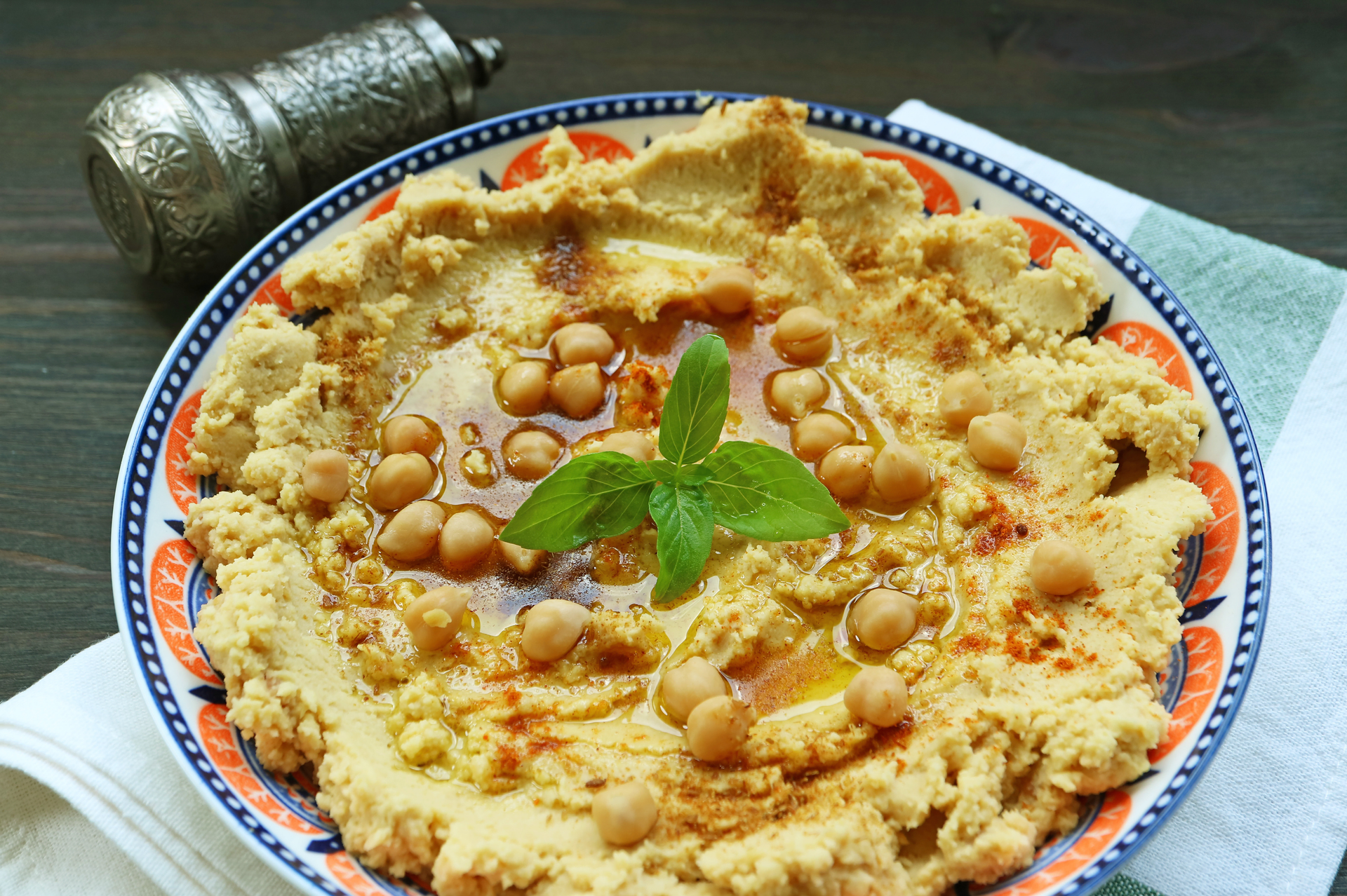 Overhead flat-lay of all ingredients for Tunisian Lablabi with Chickpeas and Harissa laid out on a kitchen surface.