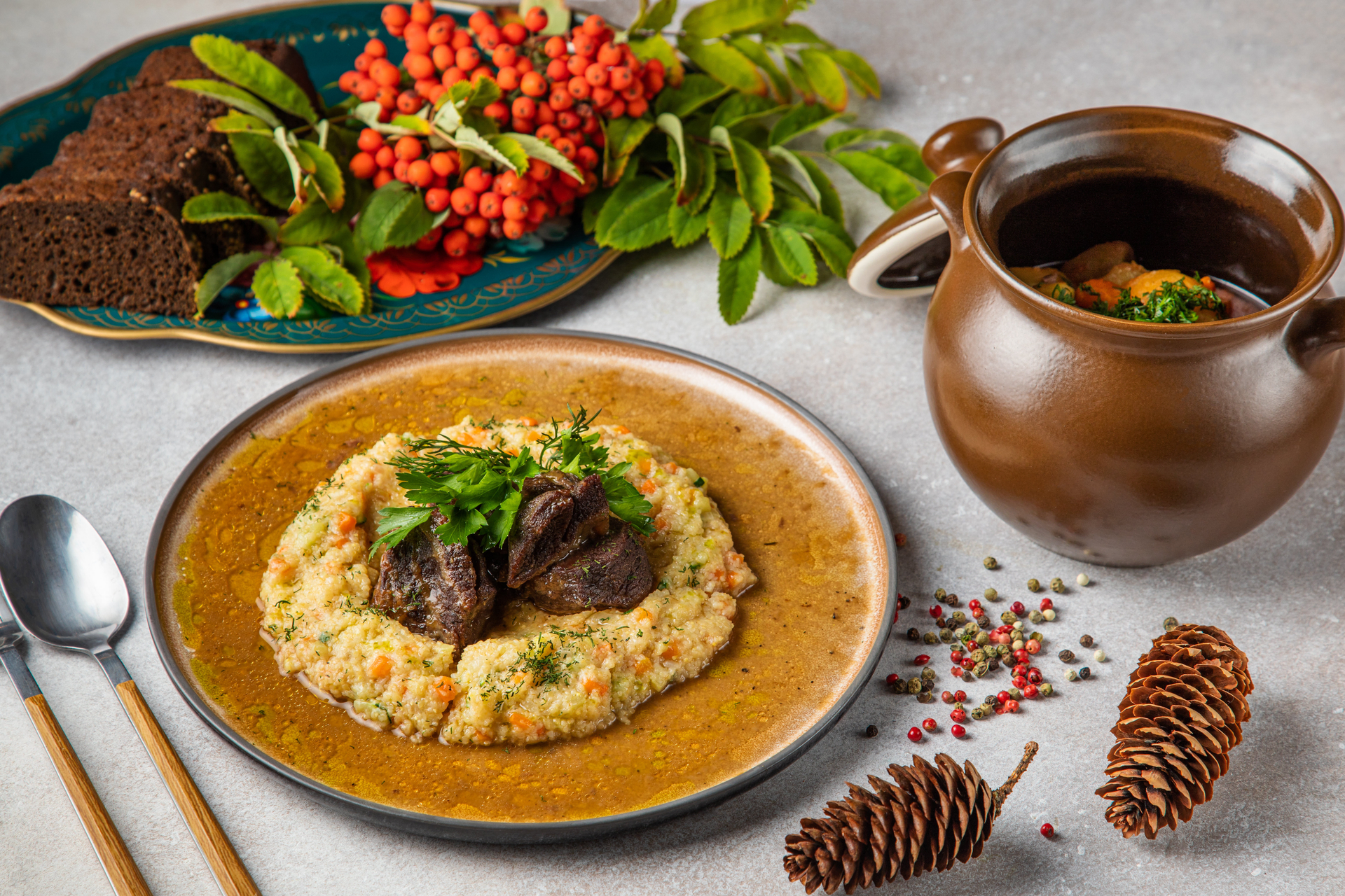 Overhead flat-lay of all ingredients for Turkish Kuzu Tandir with Saffron Rice laid out on a kitchen surface.