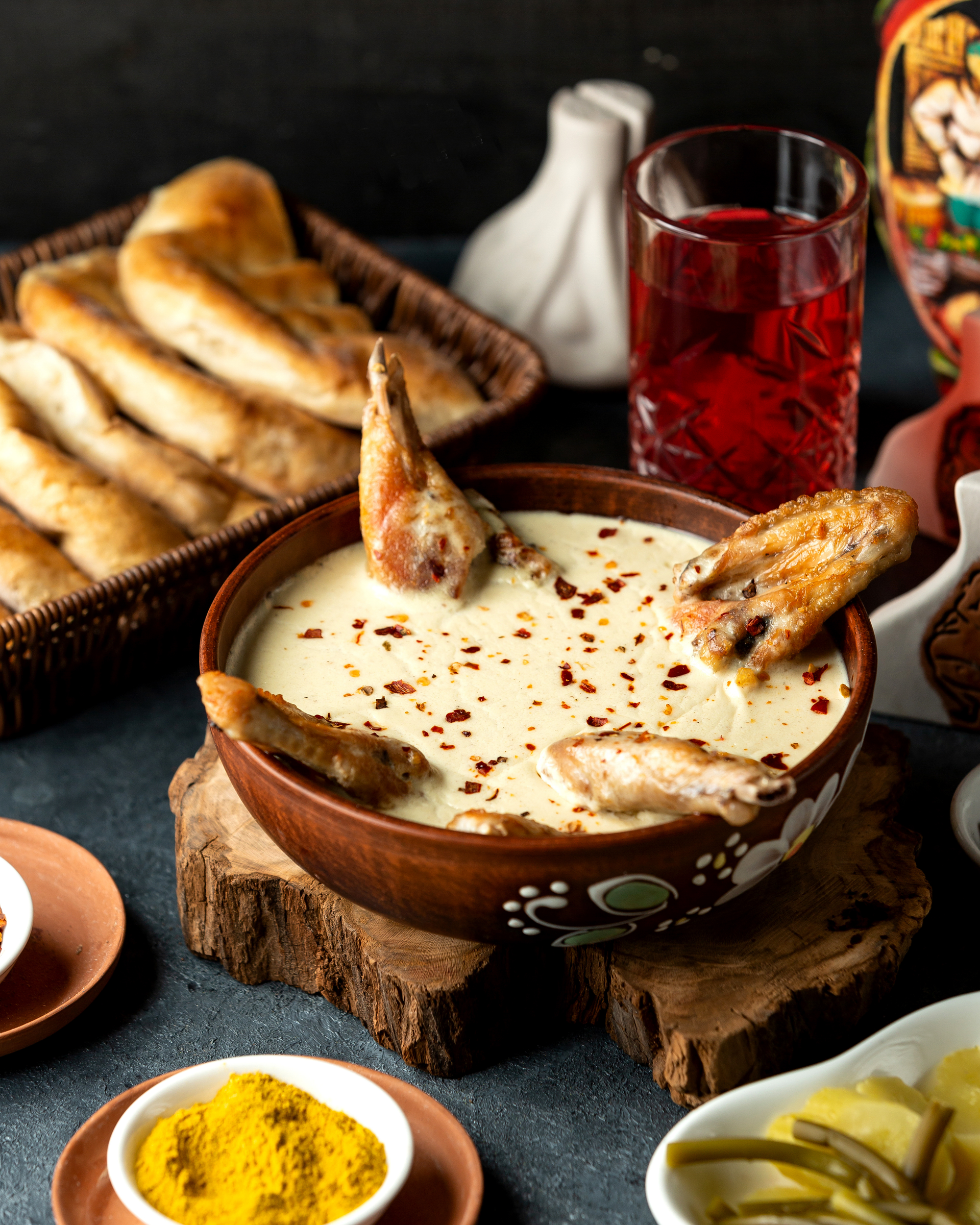 Overhead flat-lay of all ingredients for Turkish Muhlama with Cheese and Cornmeal laid out on a kitchen surface.