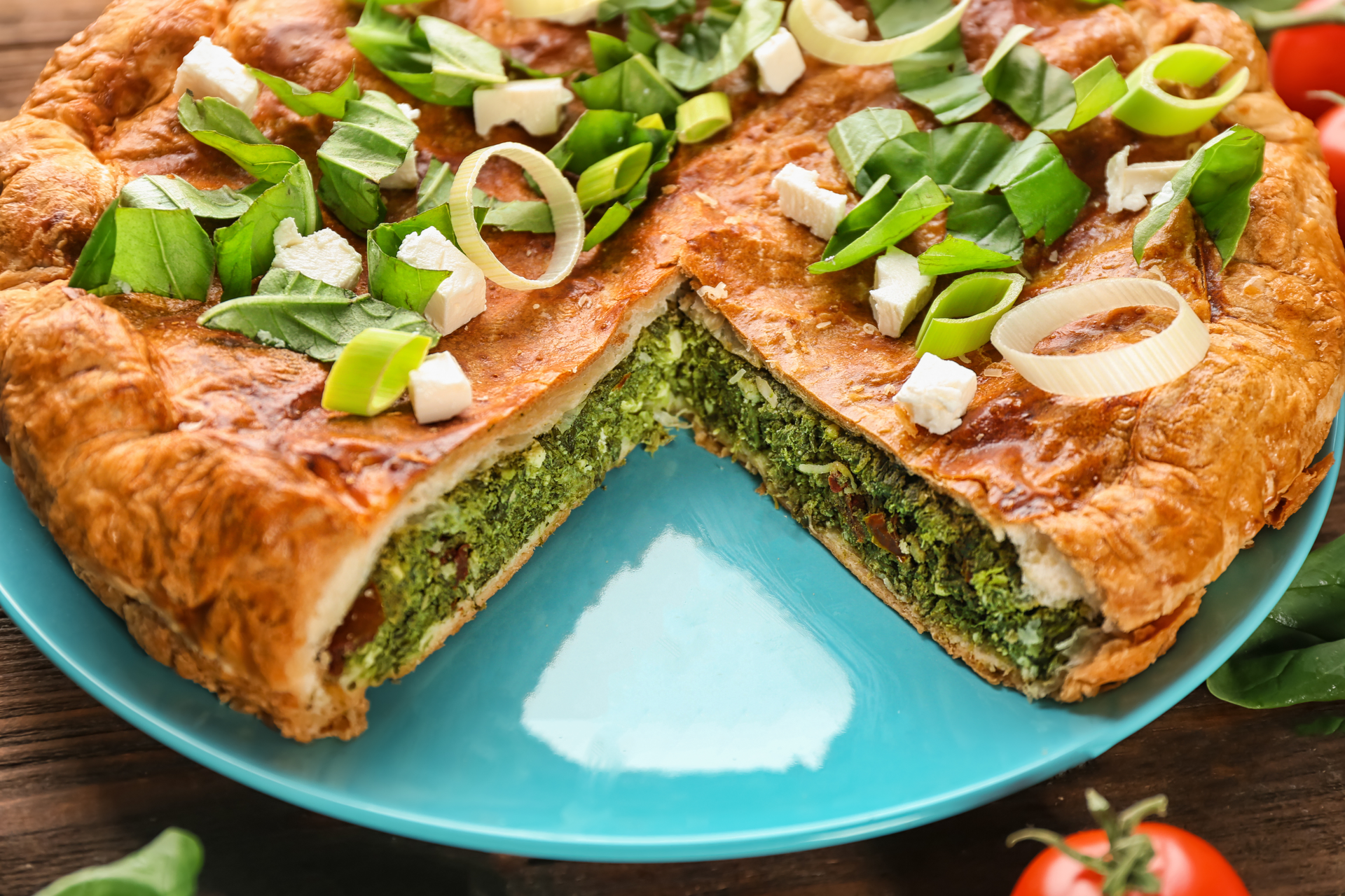 Overhead flat-lay of all ingredients for Turkish Spinach Borek with Spiced Lamb Filling laid out on a kitchen surface.
