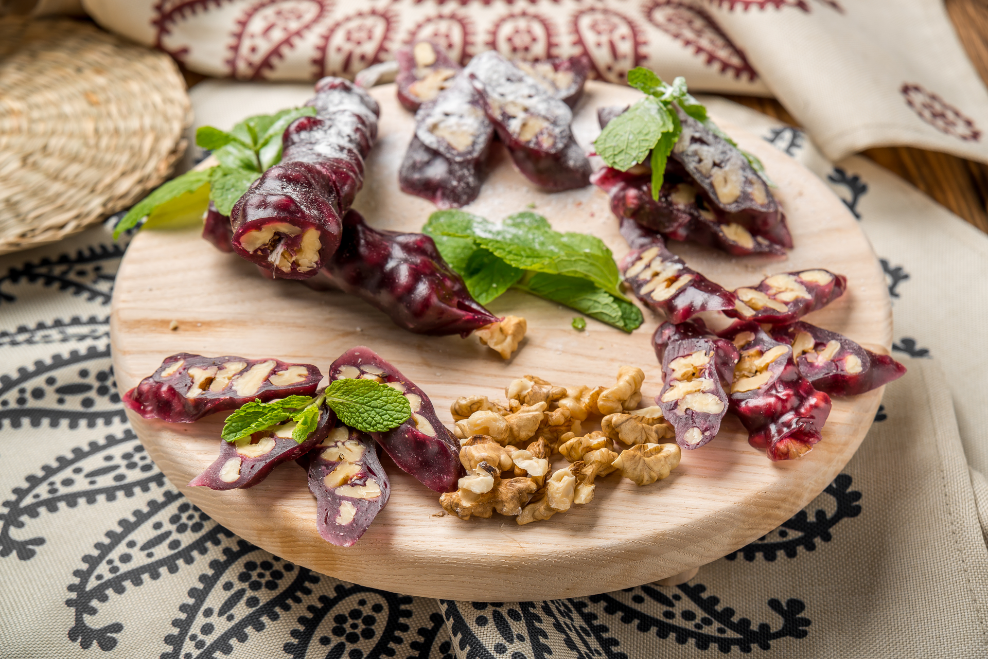 Overhead flat-lay of all ingredients for Vegan Lebanese Kousa Mahshi with Pine Nuts and Pomegranate Syrup laid out on a kitchen surface.