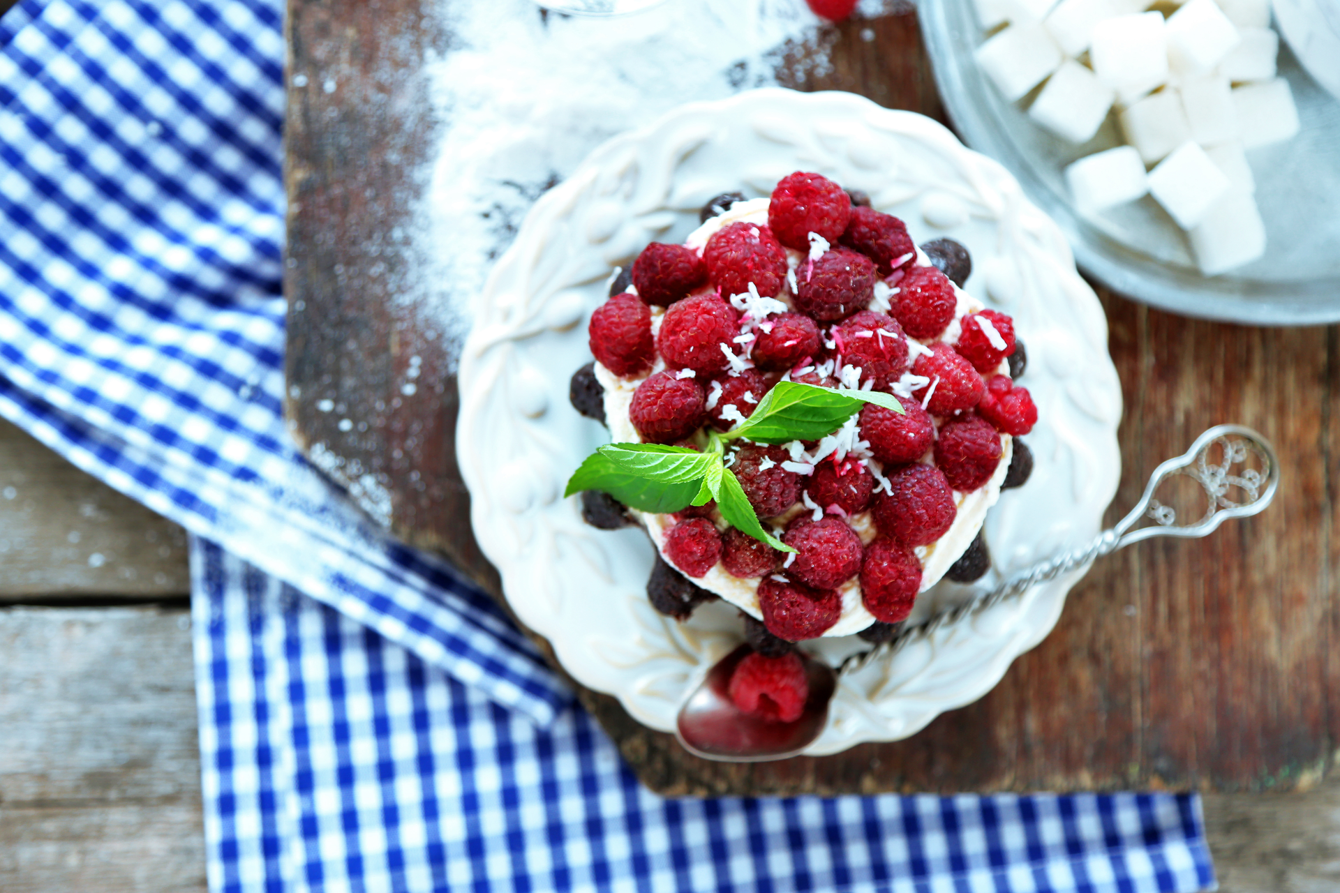 Overhead flat-lay of all ingredients for Velvety Russian Kissel Dessert with Fresh Berries laid out on a kitchen surface.