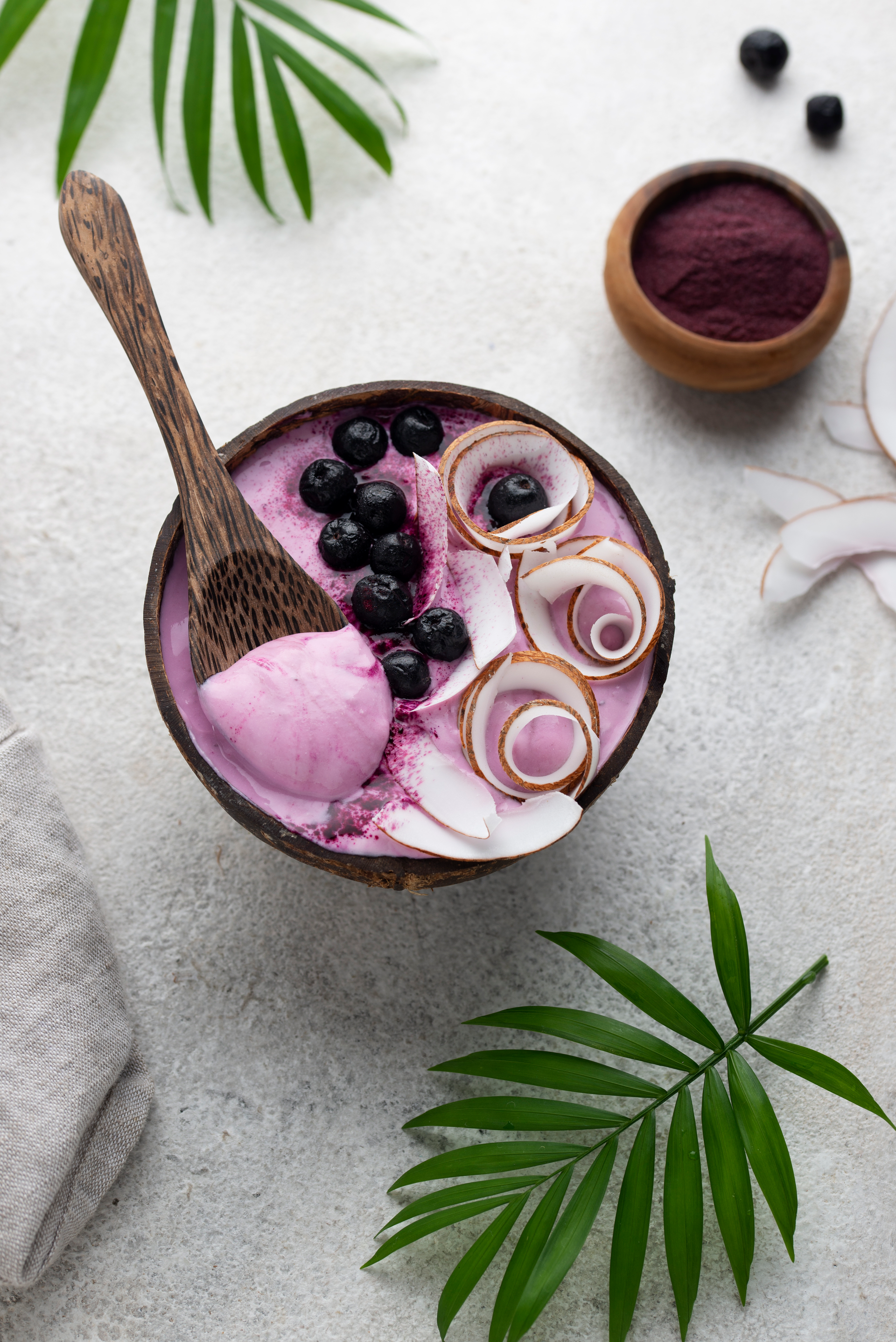 Vibrant Brazilian Açaí Smoothie Bowl with Tropical Fruits — Breakfast served and photographed from above