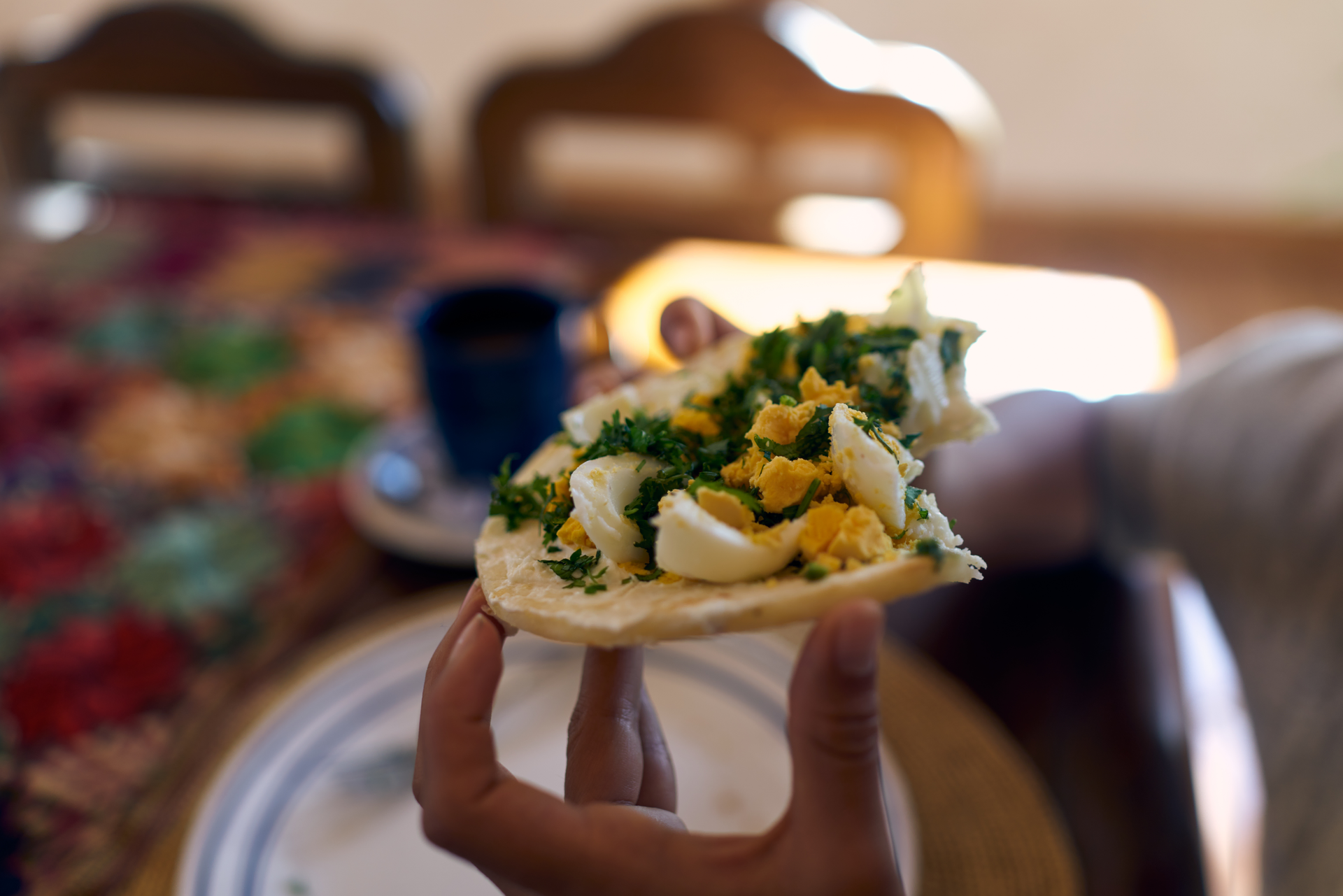 Overhead flat-lay of all ingredients for Vibrant Israeli Sabich Pita with Pickled Mango and Hummus laid out on a kitchen surface.