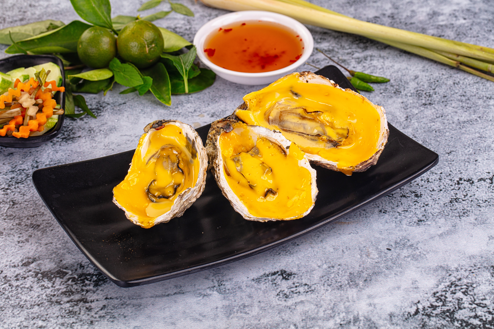 Overhead flat-lay of all ingredients for Vietnamese Banh Khot with Turmeric Shrimp Filling laid out on a kitchen surface.