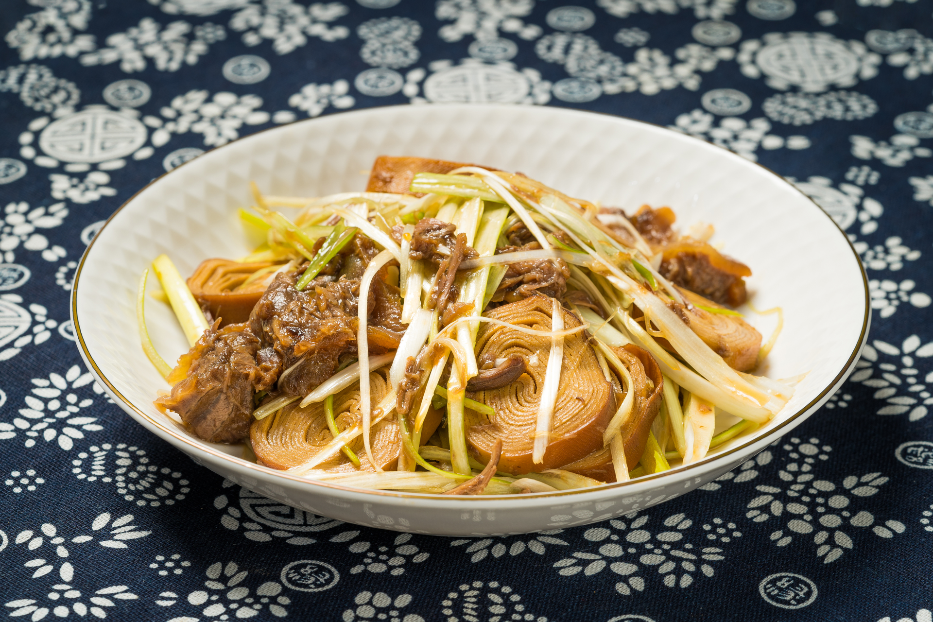 Overhead flat-lay of all ingredients for Vietnamese Lemongrass Pork Noodles with Chili Lime Sauce laid out on a kitchen surface.