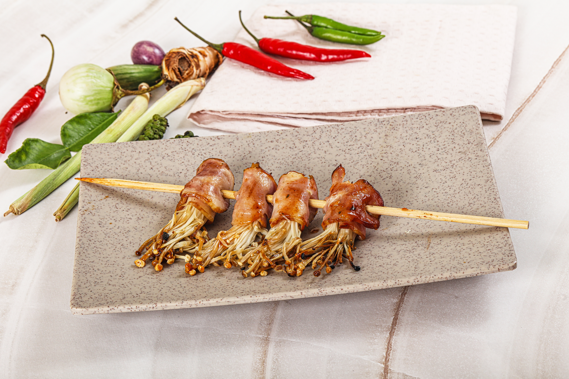 Overhead flat-lay of all ingredients for Vietnamese Sugarcane Shrimp Skewers with Sweet Chili Sauce laid out on a kitchen surface.