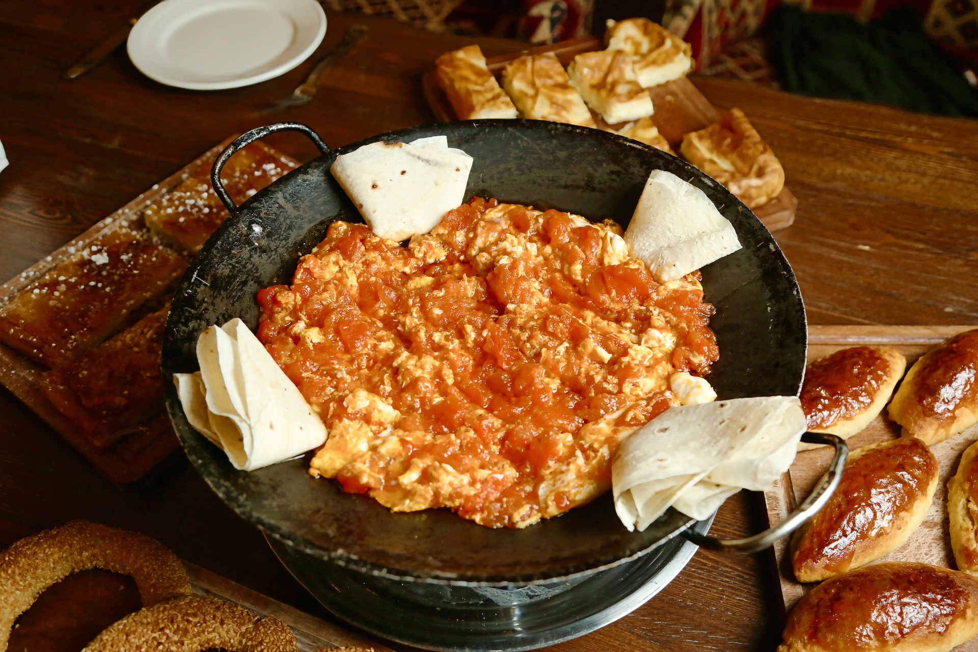 Warm Serbian Ajvar Flatbread with Grated Cheese — Appetizer served and photographed from above