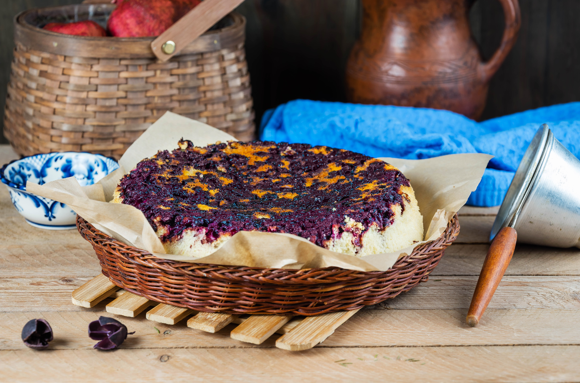 Overhead flat-lay of all ingredients for Zesty Brazilian Acai Berry Cheesecake with Almond Crust laid out on a kitchen surface.
