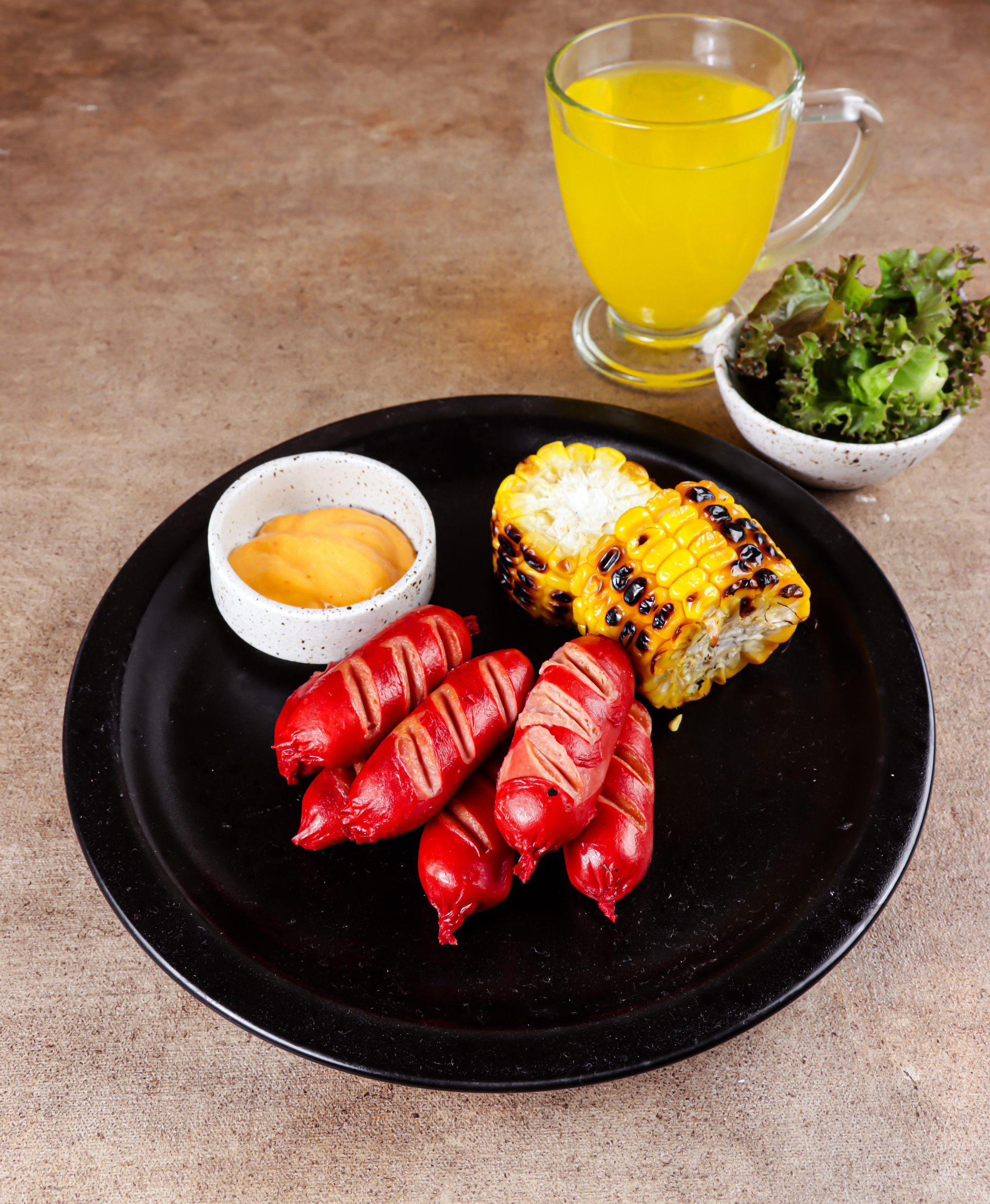 Overhead flat-lay of all ingredients for Zesty Filipino Embutido with Tangy Ketchup Glaze laid out on a kitchen surface.