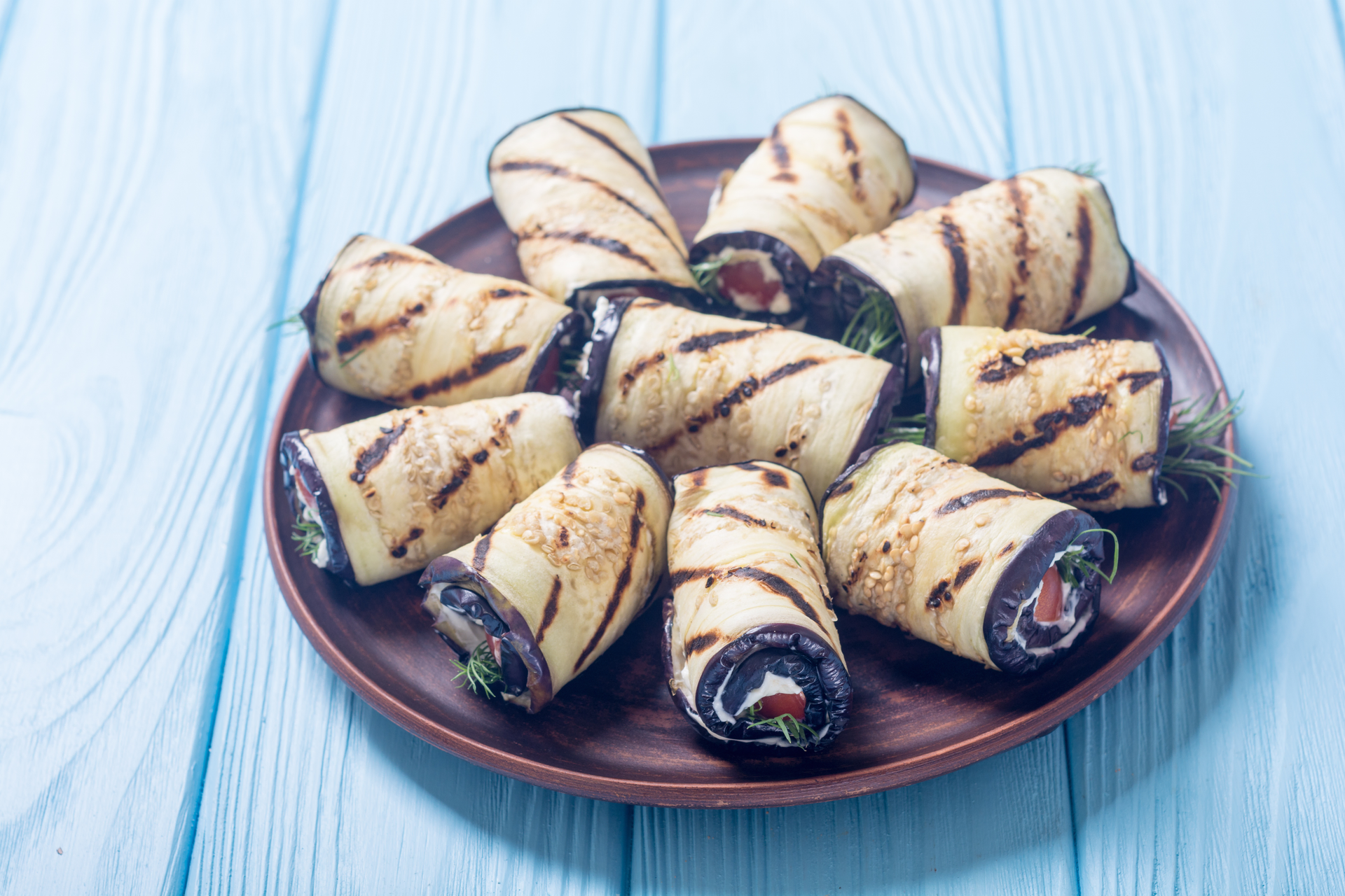 Zesty Georgian Badrijani Eggplant Rolls with Walnut Paste — Appetizer served and photographed from above