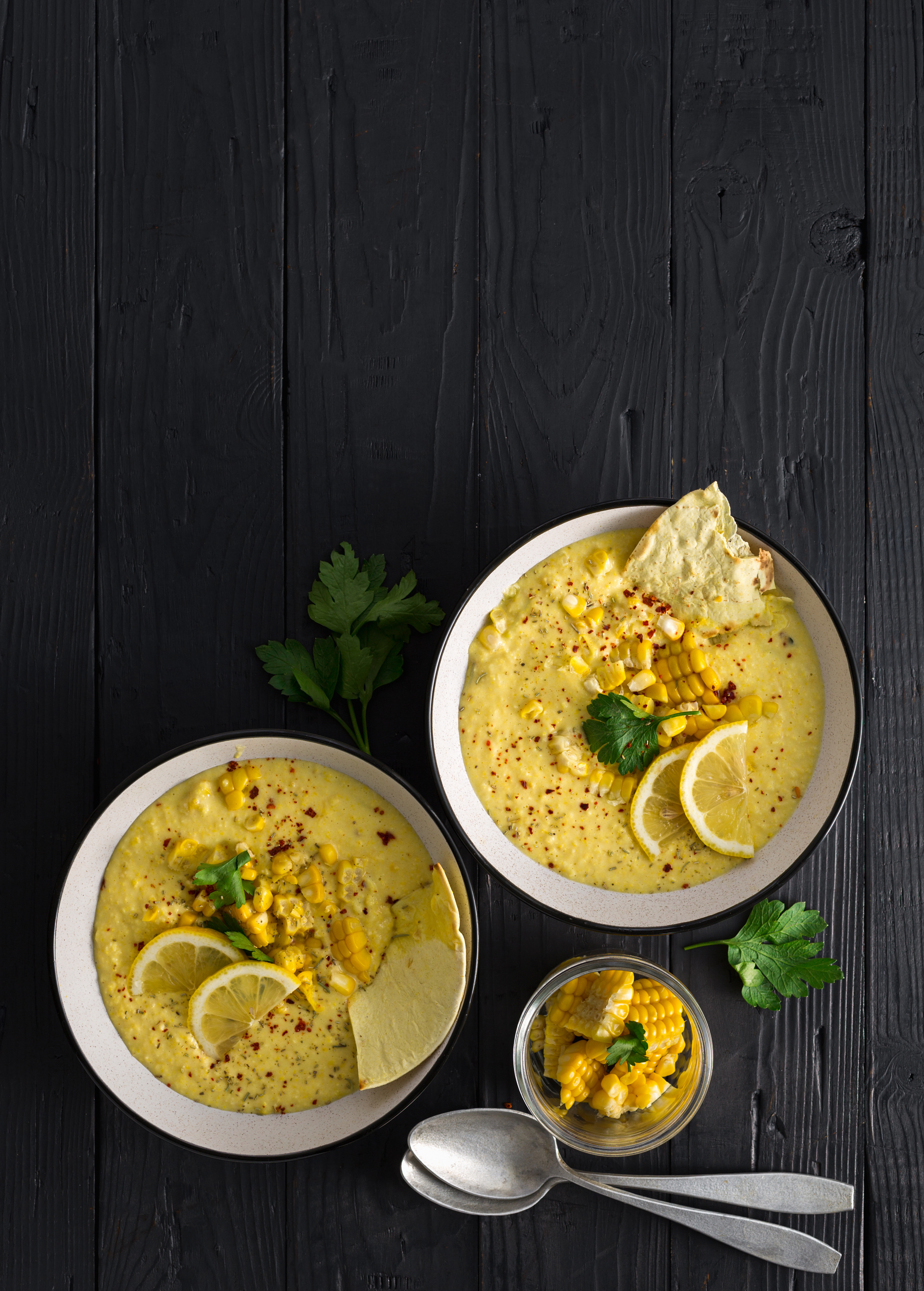 Zesty Greek Avgolemono Soup with Lemon and Orzo — Soup served and photographed from above
