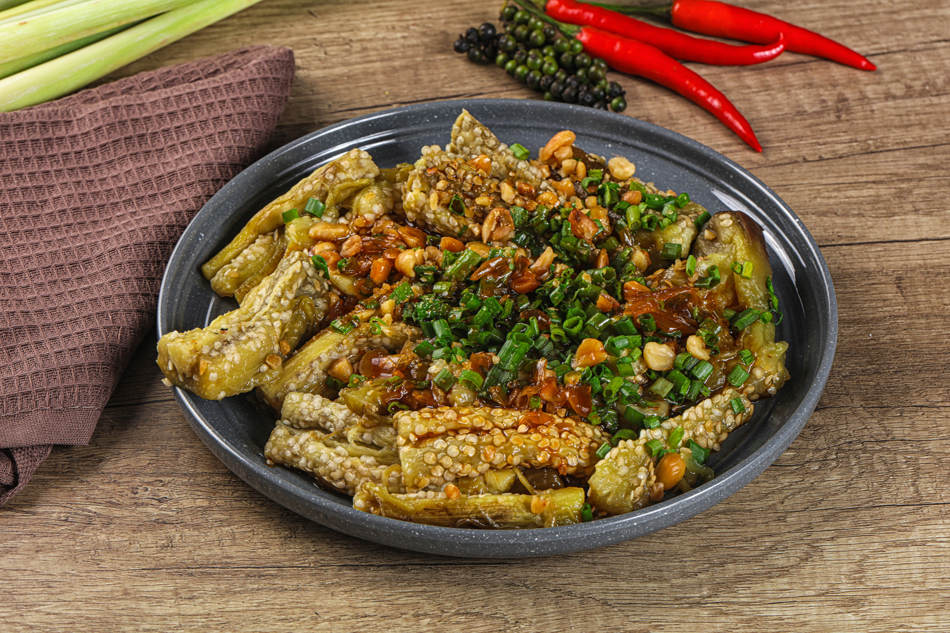 Overhead flat-lay of all ingredients for Zesty Indonesian Sambal Goreng Tempeh with Green Beans laid out on a kitchen surface.