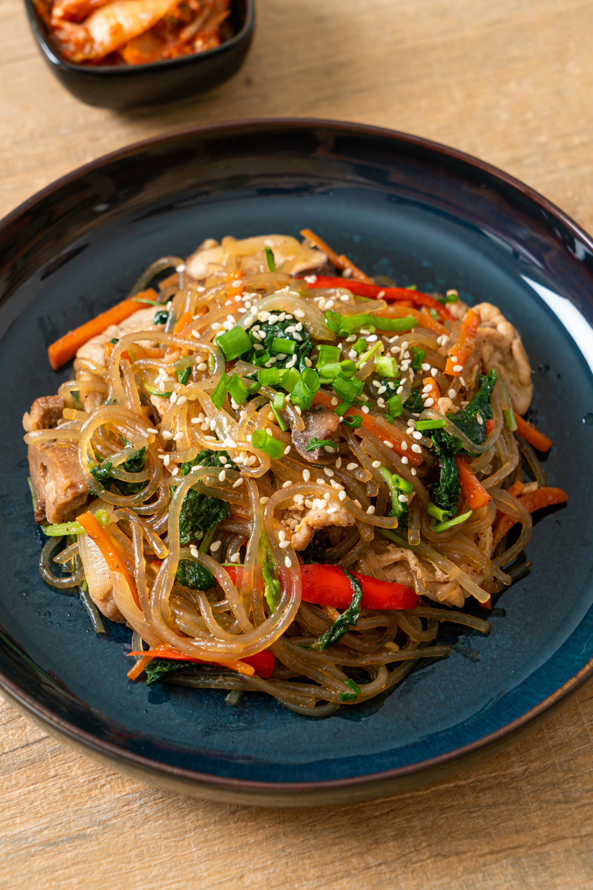 Zesty Korean Bulgogi Noodles with Scallion Garnish — Main Course served and photographed from above